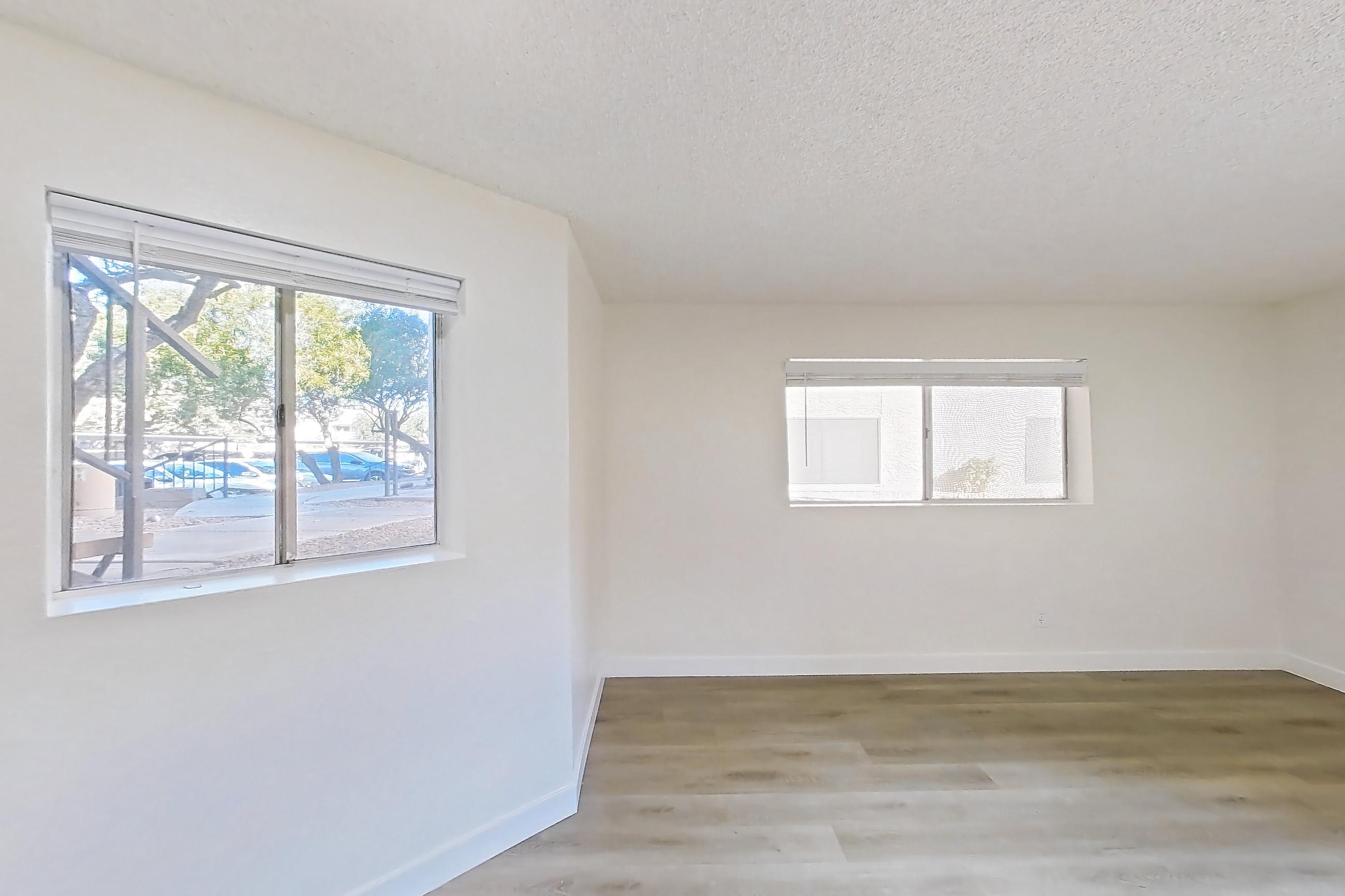 Dining room with light wood-finish flooring, Apartment 1061 at Terra Vida Apartments