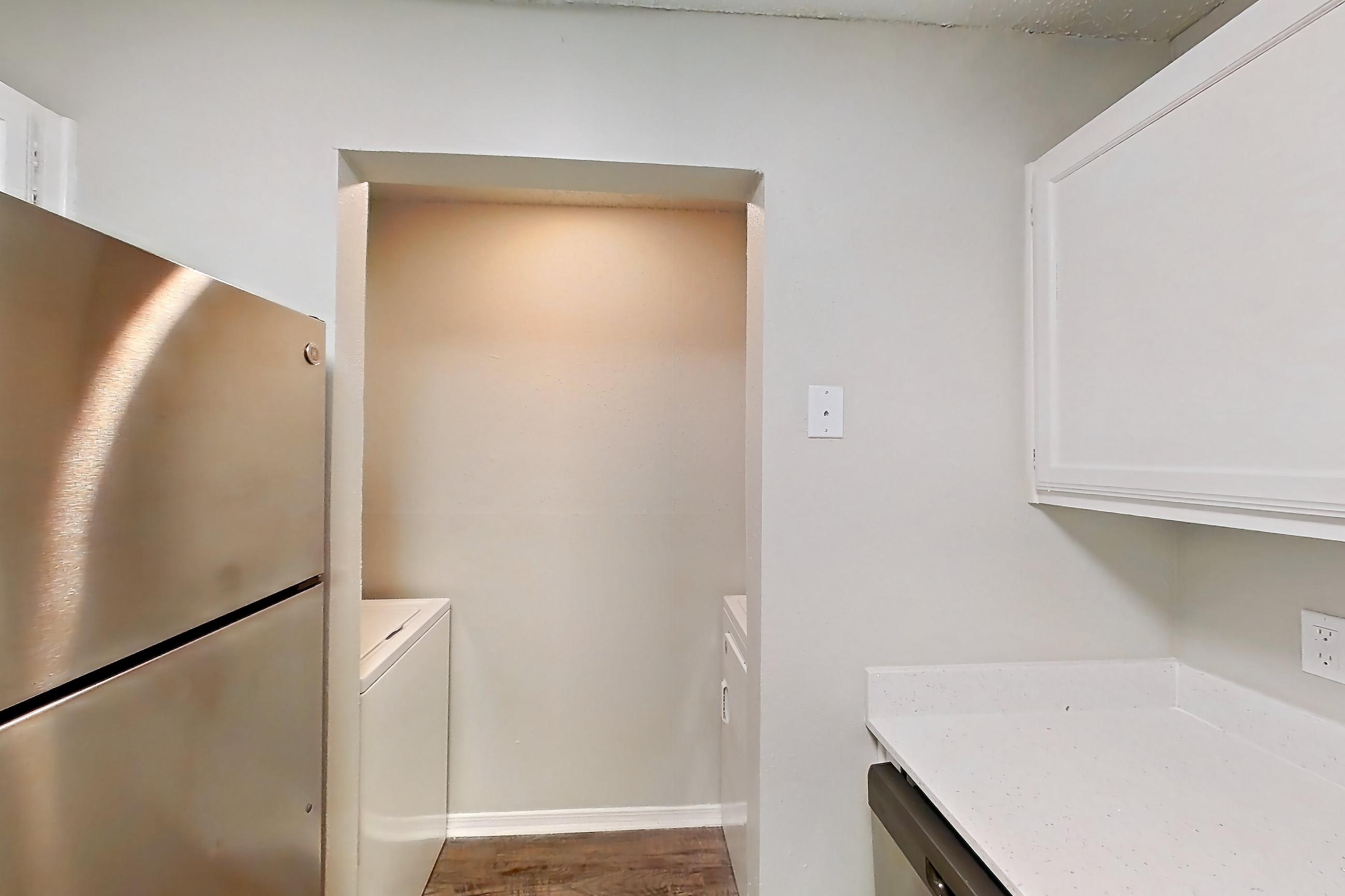 Kitchen in Apartment 21-2122 at The Arbors of Las Colinas, 2A floor plan
