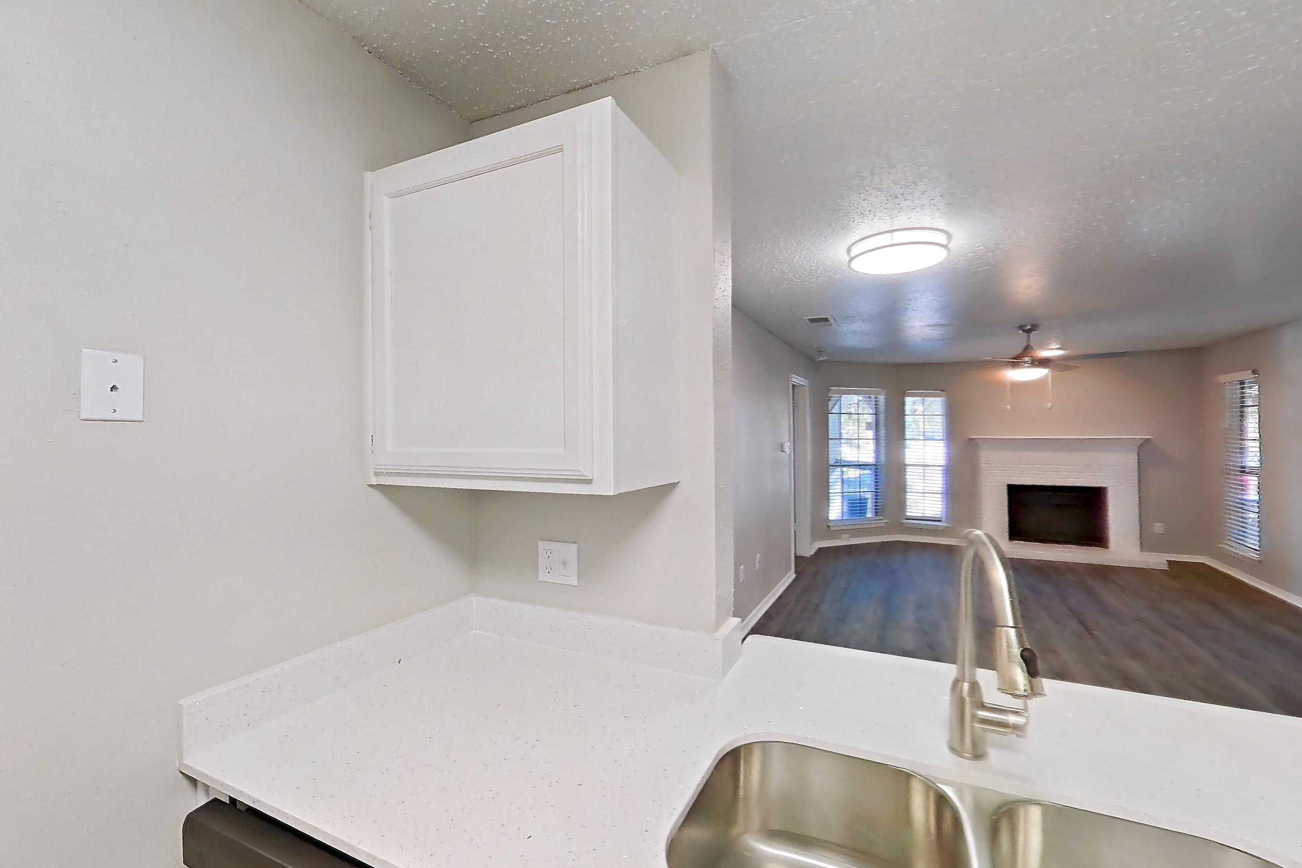 Kitchen in Apartment 21-2122 at The Arbors of Las Colinas, 2A floor plan