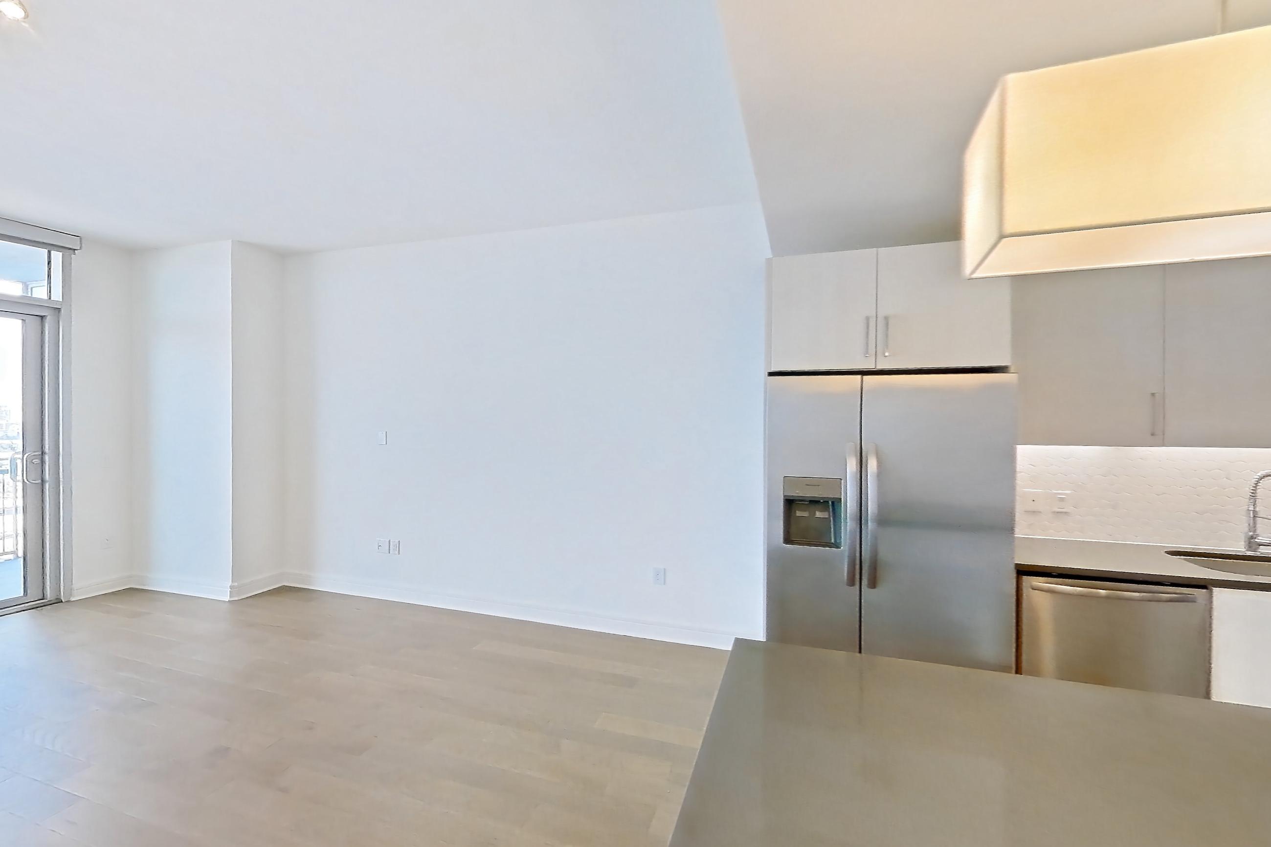 Living space in a A8 floor plan apartment, representative of Apartment 1008 at Luminary Residences