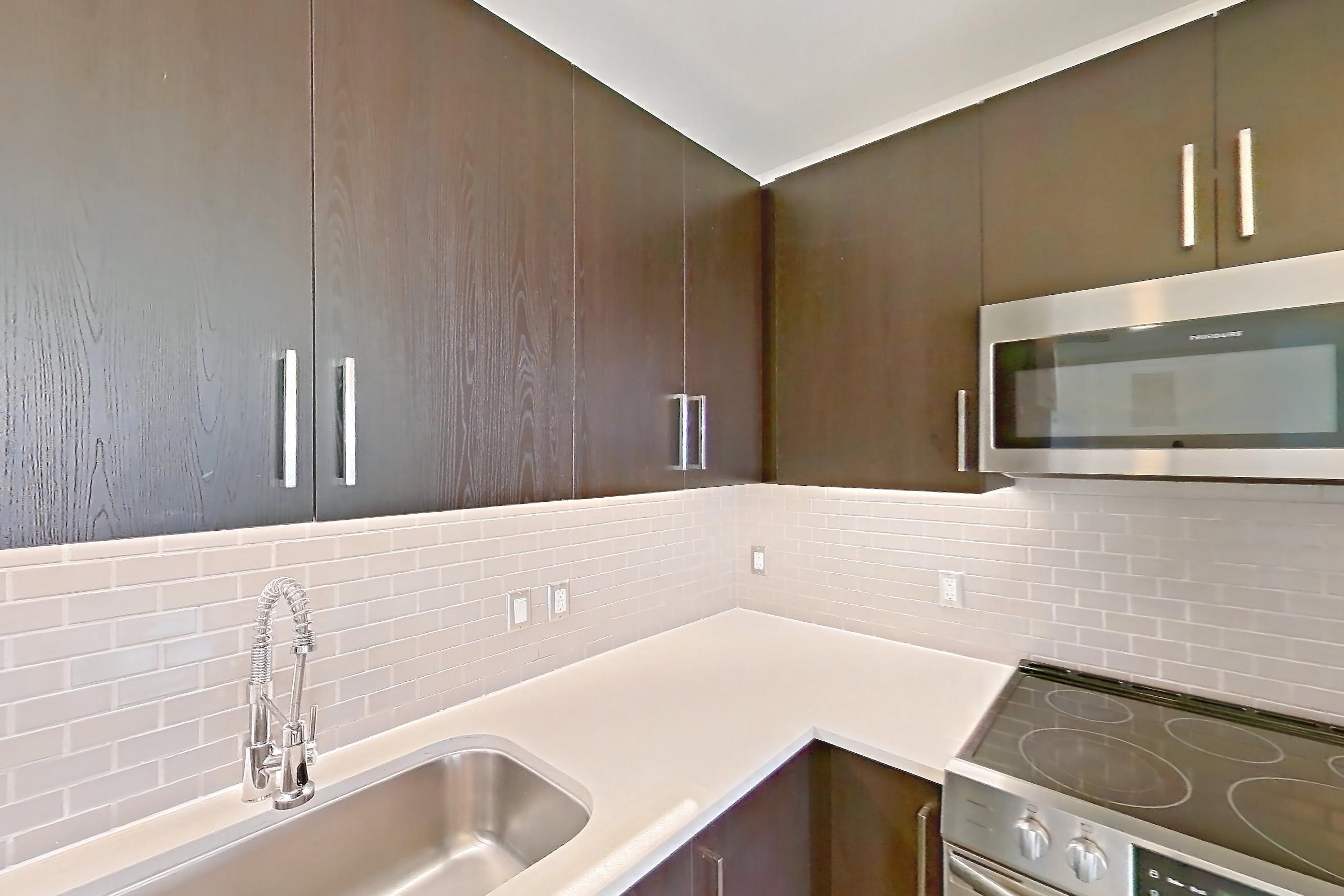 Kitchen in a B3 floor plan apartment, representative of Apartment 2210 at Luminary Residences