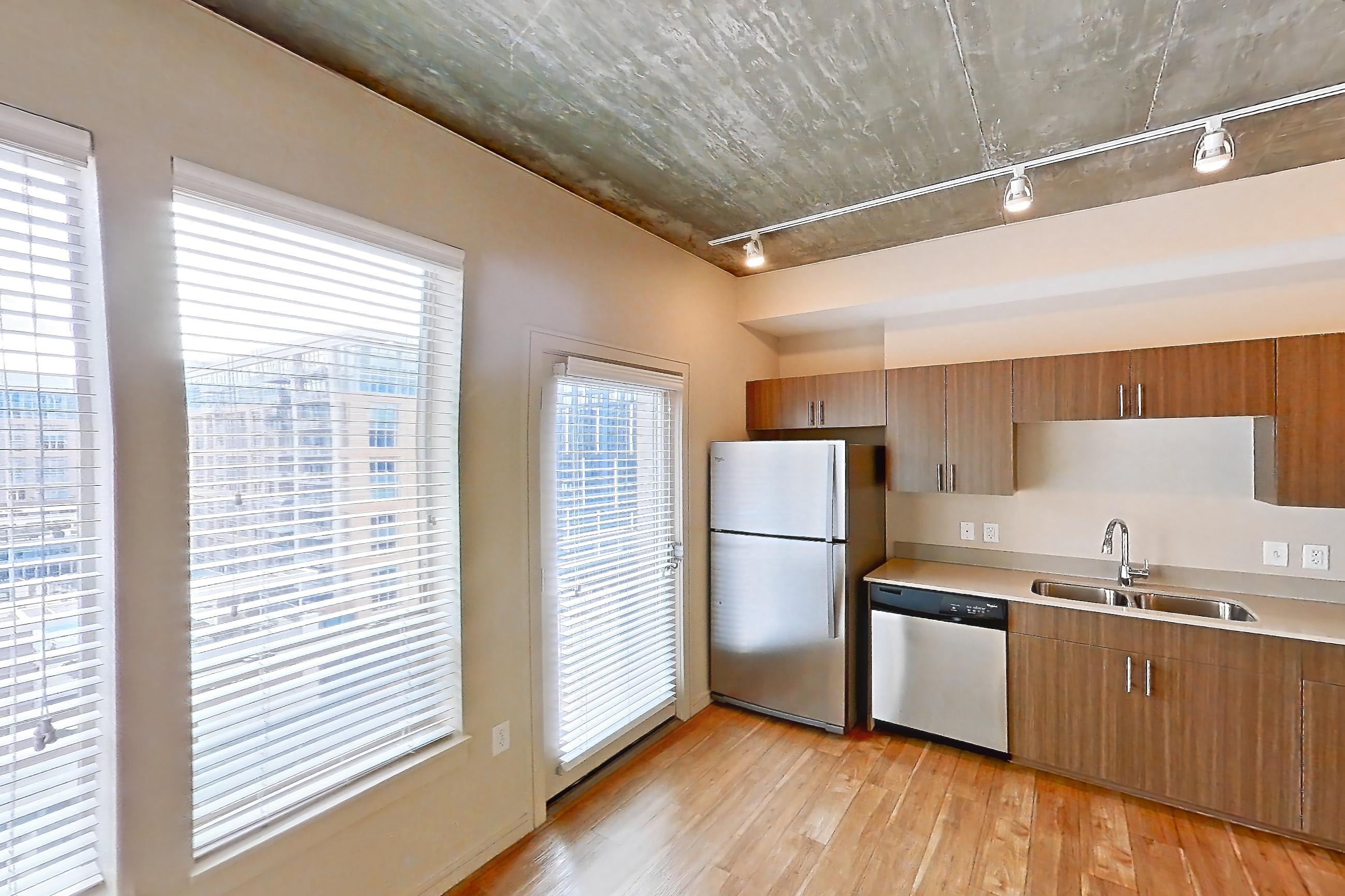 Living space in Apartment 1014 at Cadence at Union Station, Eldridge floor plan
