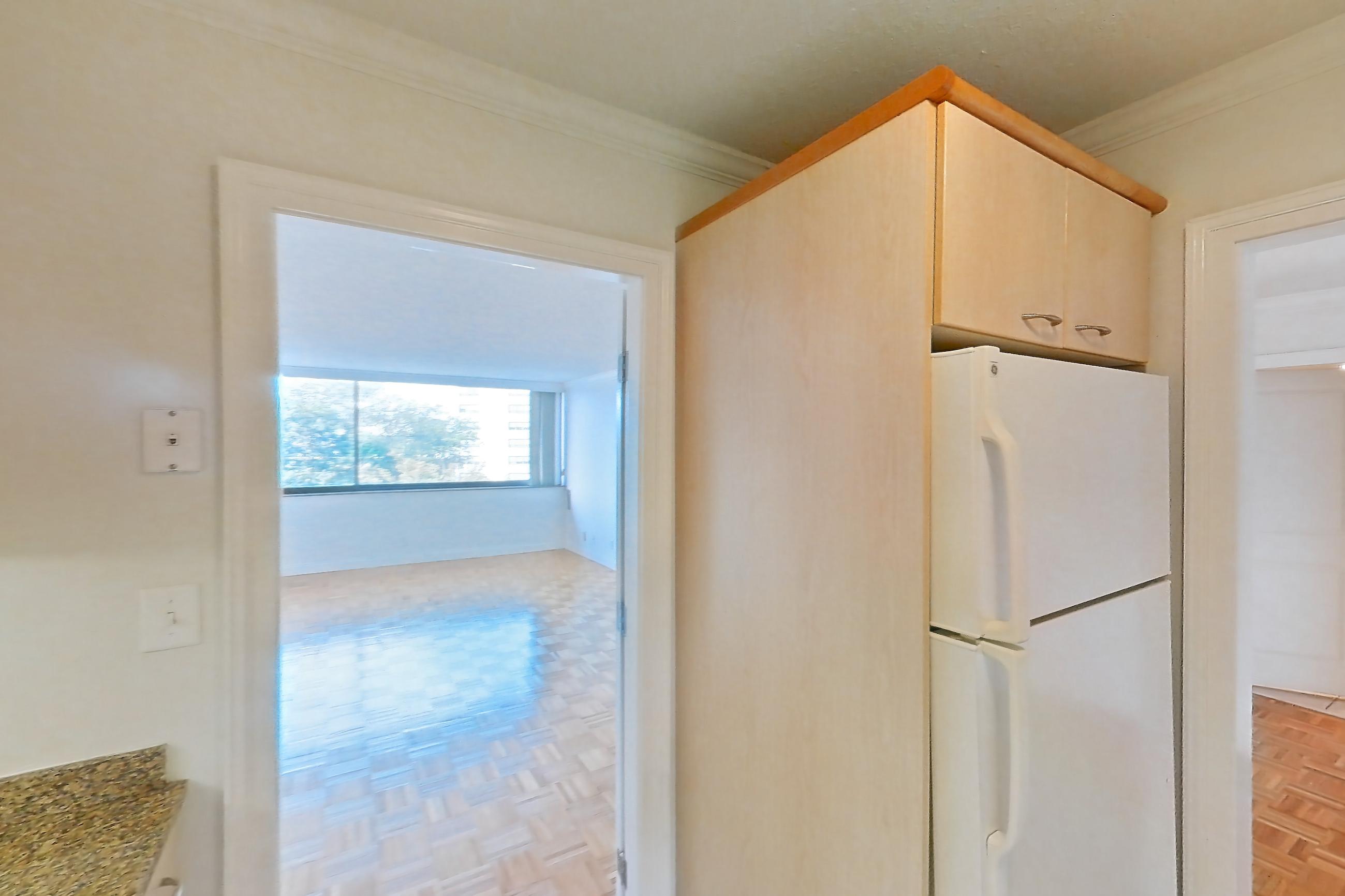 Kitchen with electric range, light stone countertops, light tile flooring, oven/range, and white appliances, Apartment 199-0604 at Church Park
