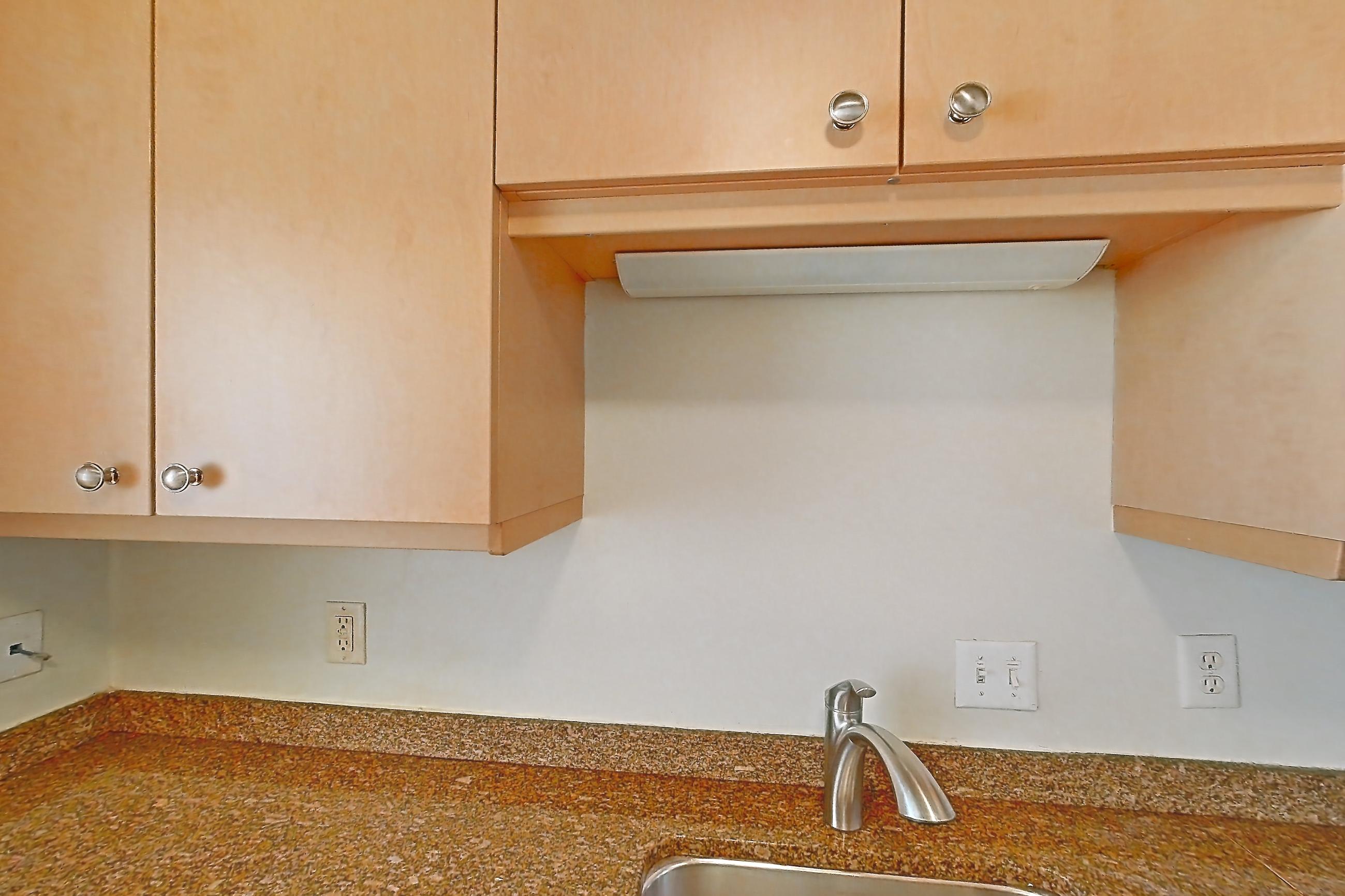 Kitchen with dark stone countertops, electric range, light tile flooring, oven/range, and white appliances, Apartment 255-0216 at Church Park