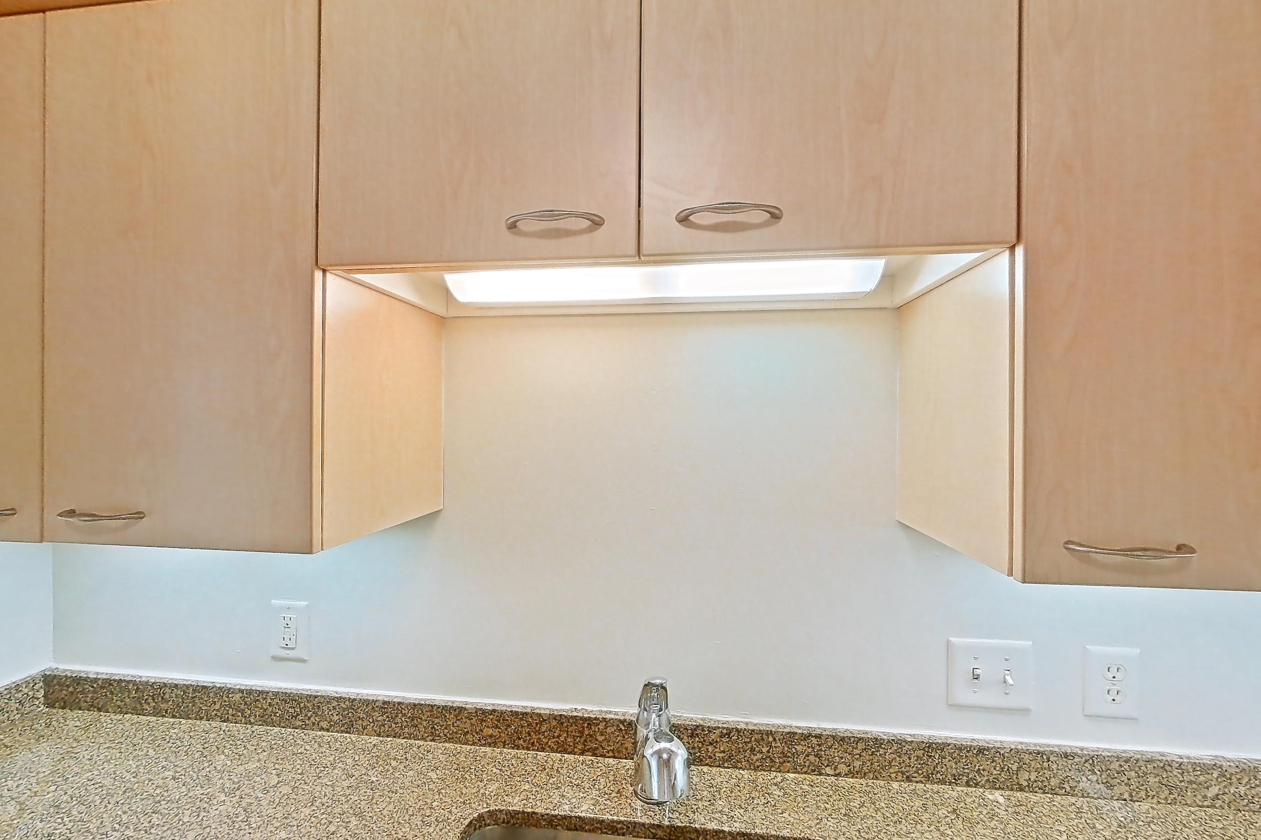Kitchen with electric range, light stone countertops, light tile flooring, oven/range, and white appliances, Apartment 199-0311 at Church Park