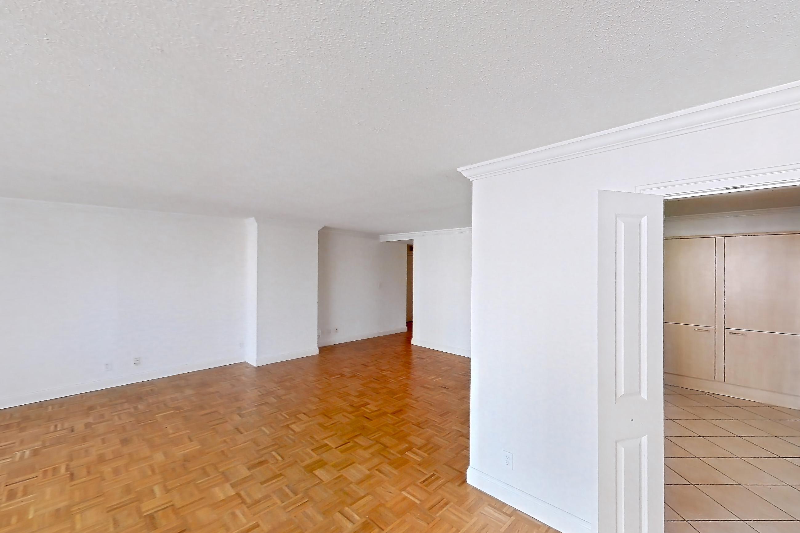 Living space with light wood-finish flooring and parquet flooring, Apartment 221-0618 at Church Park
