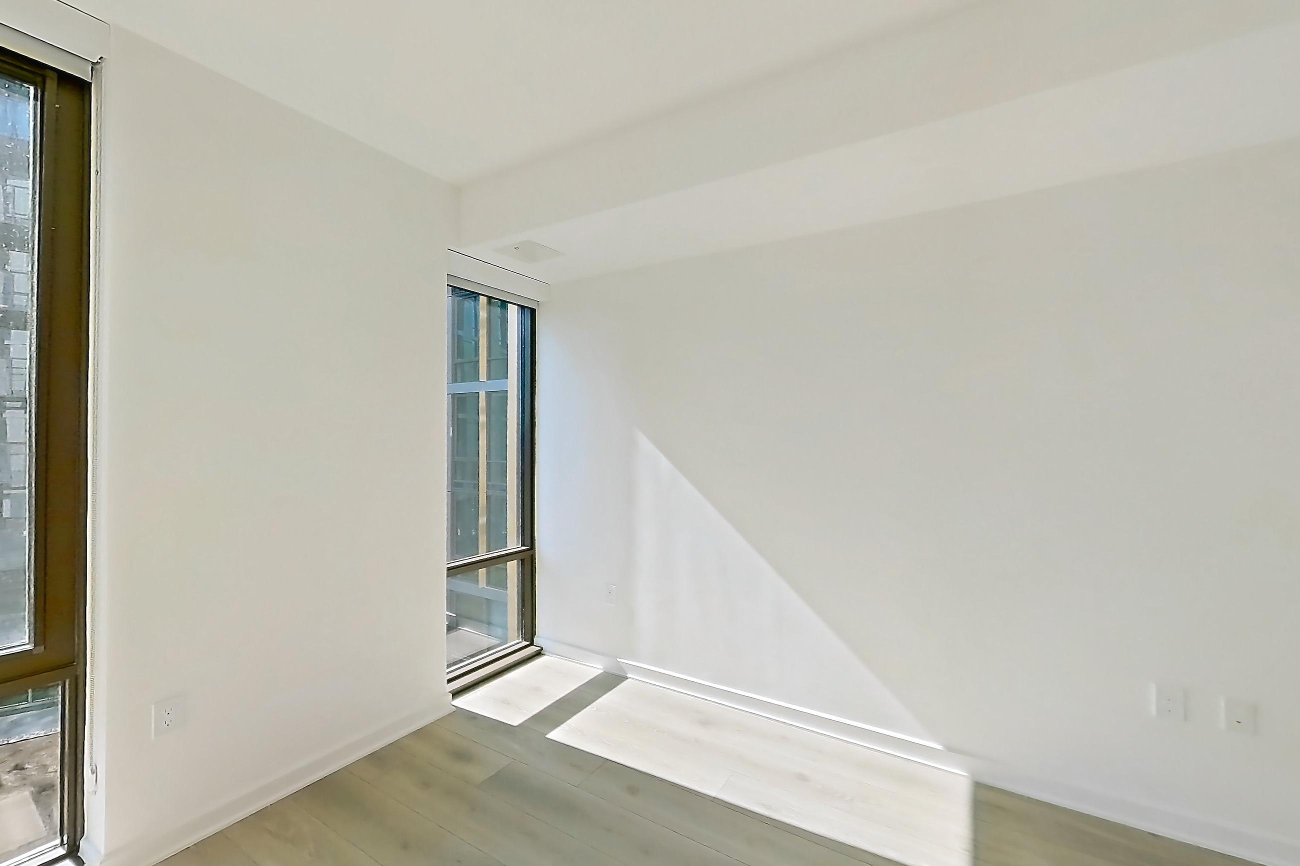 Living space with light wood-finish flooring and wood-finish flooring, Apartment 1038 at Zephyr