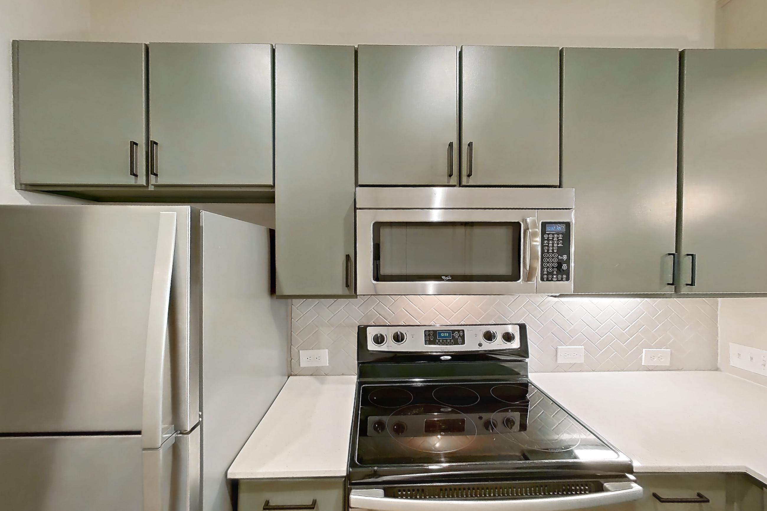 Kitchen in Apartment 1011 at La Maison at River Oaks, A1 floor plan