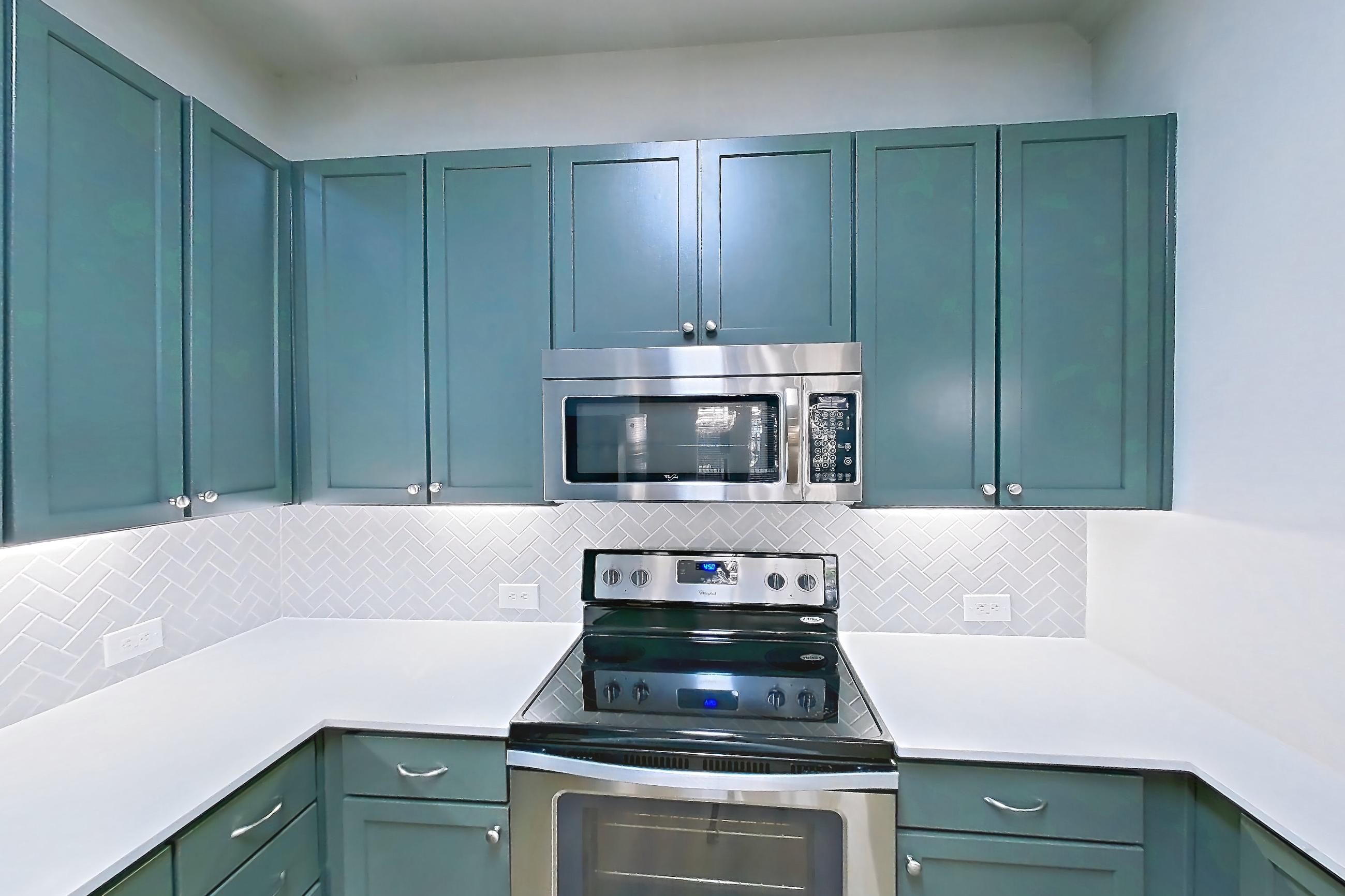 Kitchen in Apartment 1015 at La Maison at River Oaks, A4 floor plan