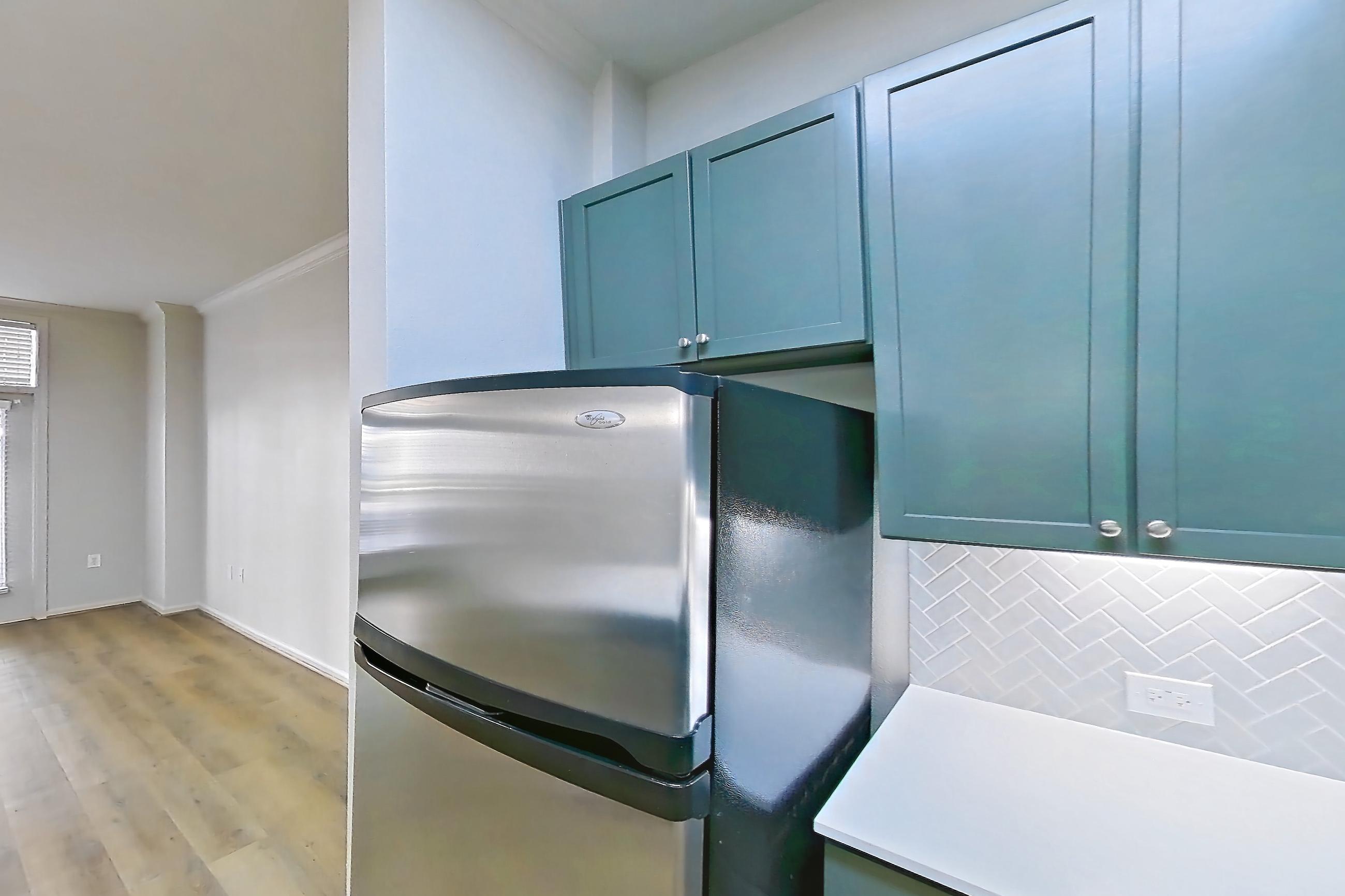 Kitchen in Apartment 1015 at La Maison at River Oaks, A4 floor plan