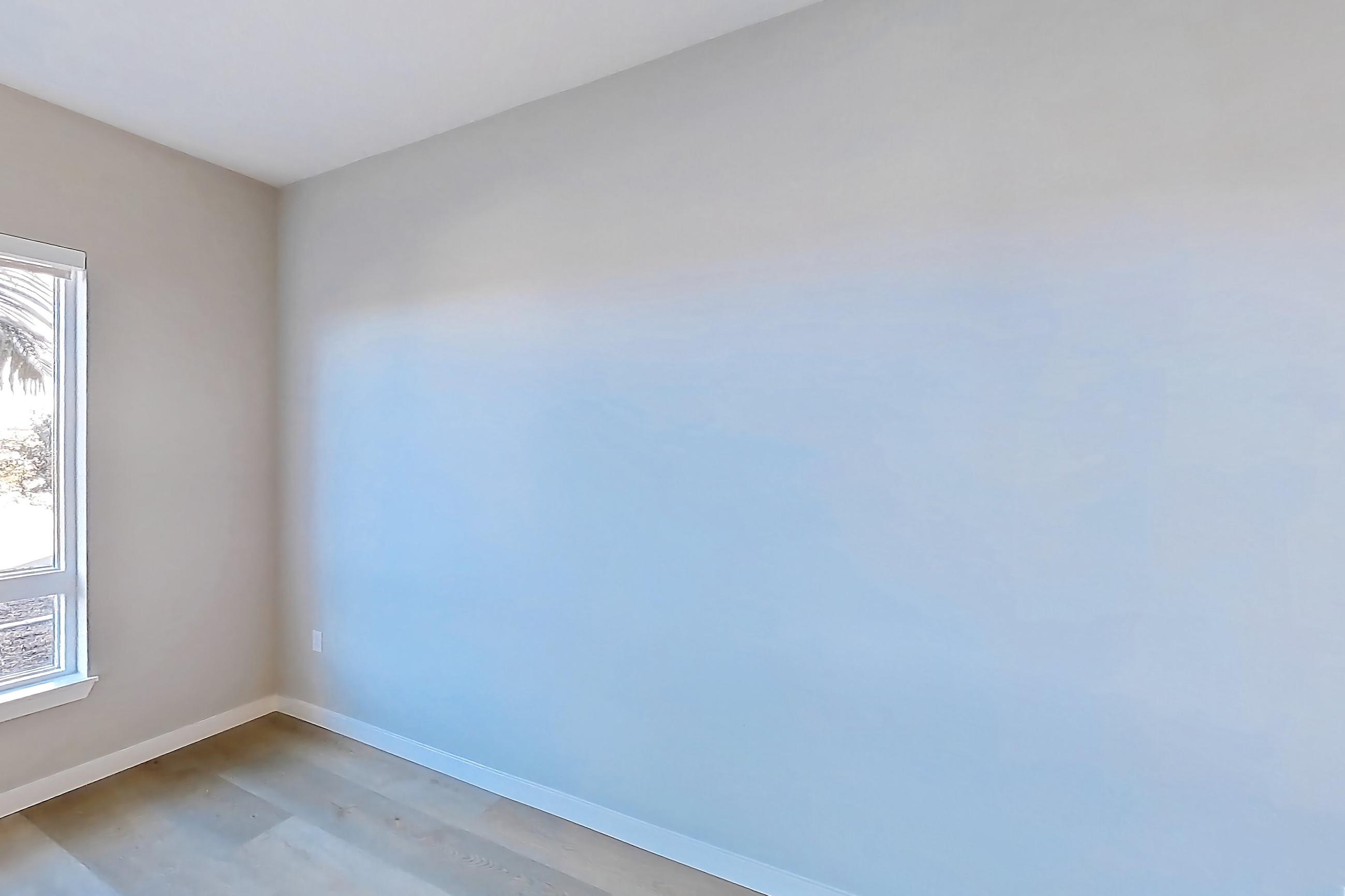 Living room with light wood-finish flooring, Apartment 1108 at VAYA on Axia