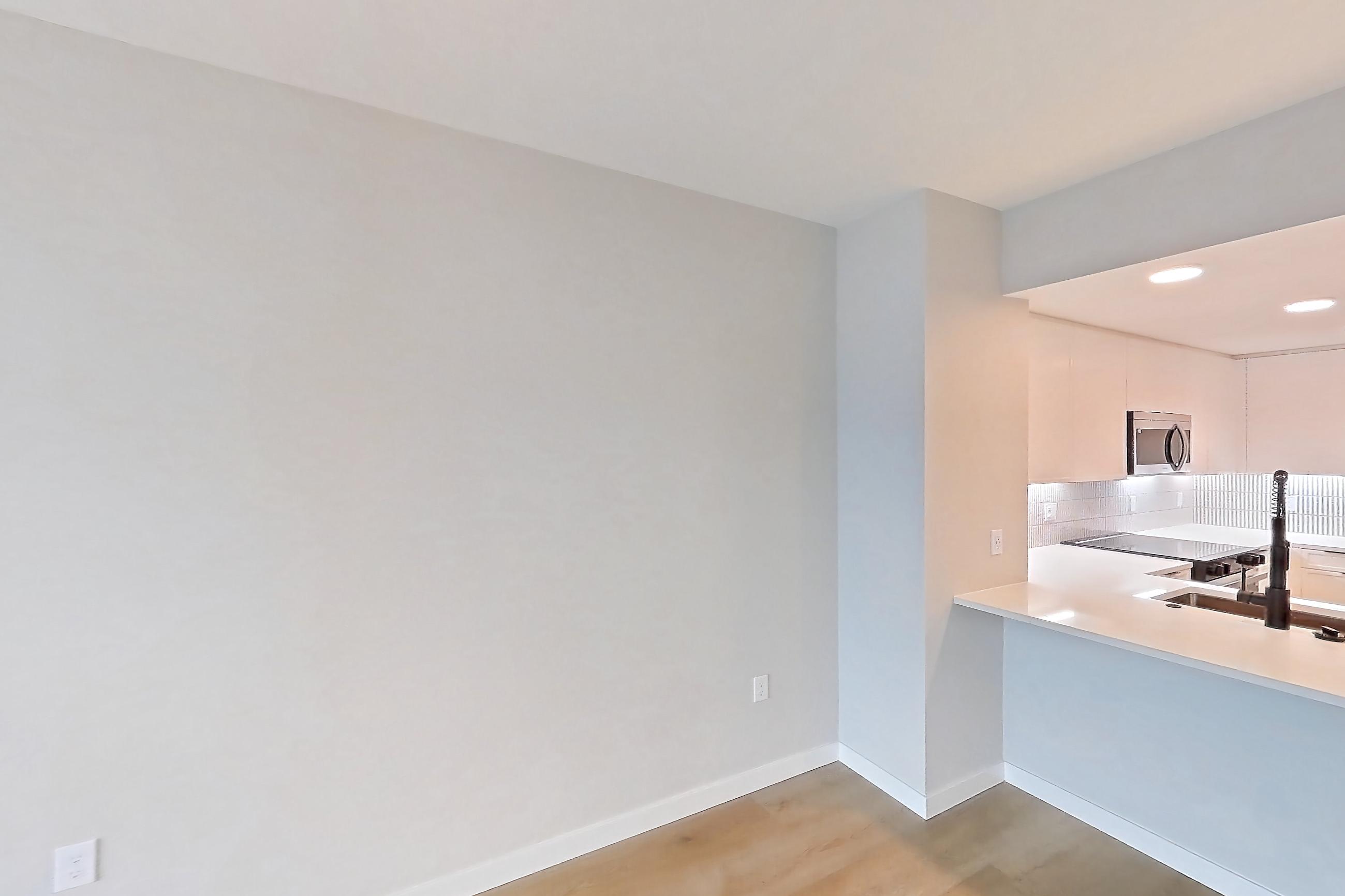 Living room with light wood-finish flooring, Apartment 1319 at VAYA on Axia