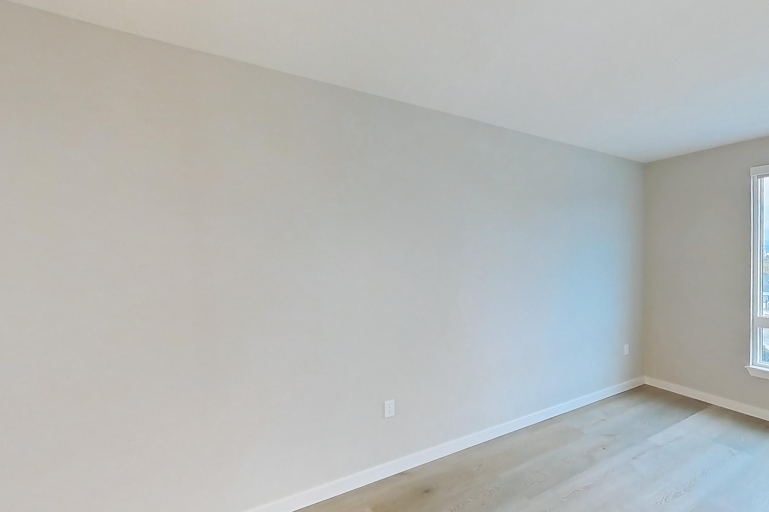 Living room with light wood-finish flooring, Apartment 1326 at VAYA on Axia