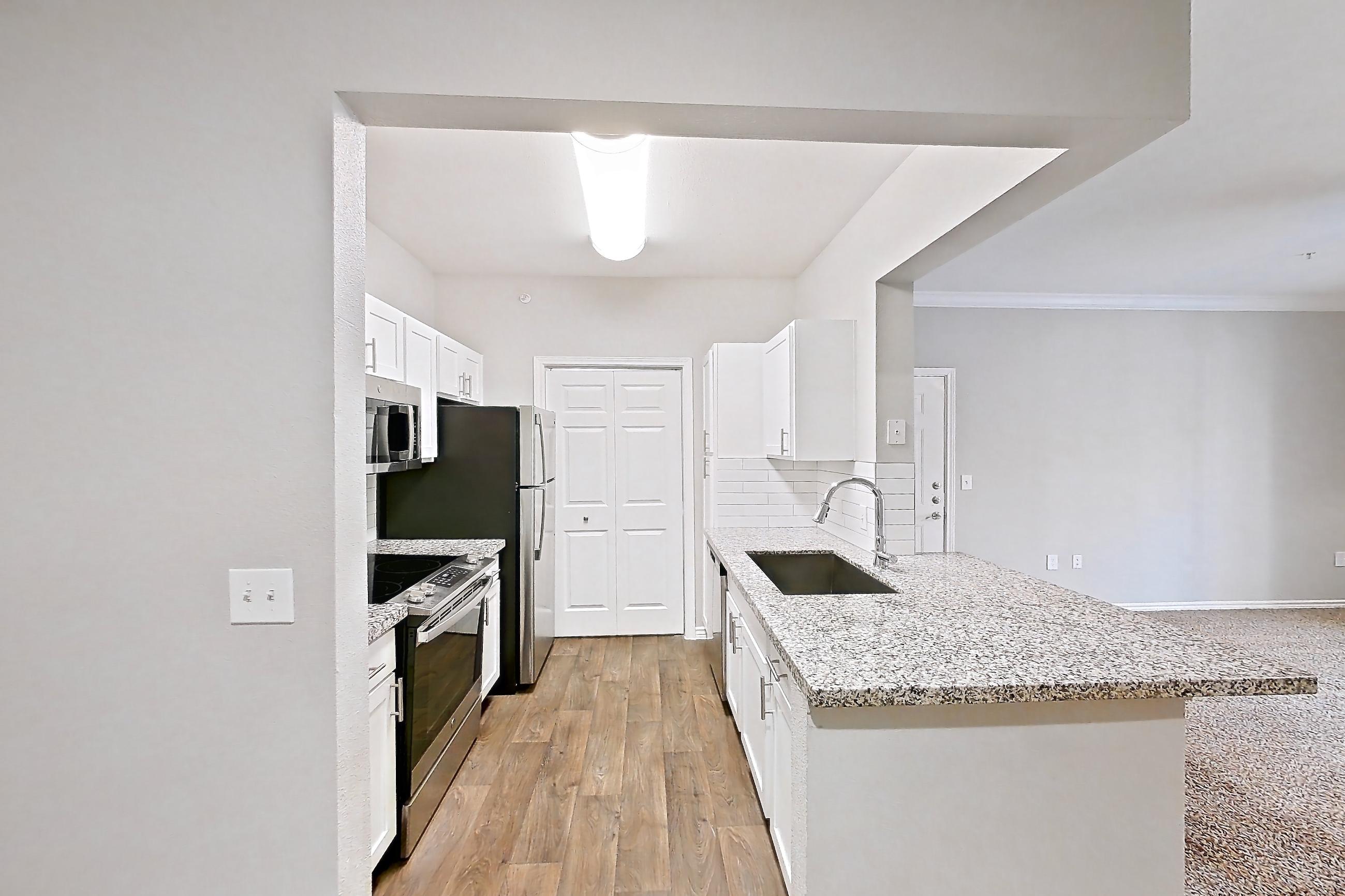 Dining room in a 1A floor plan apartment, representative of Apartment 1237 at Reserve at Kingwood