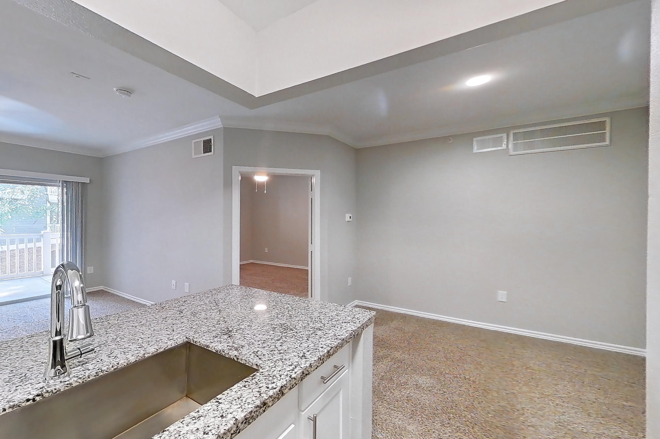 Kitchen in a 1A floor plan apartment, representative of Apartment 1237 at Reserve at Kingwood