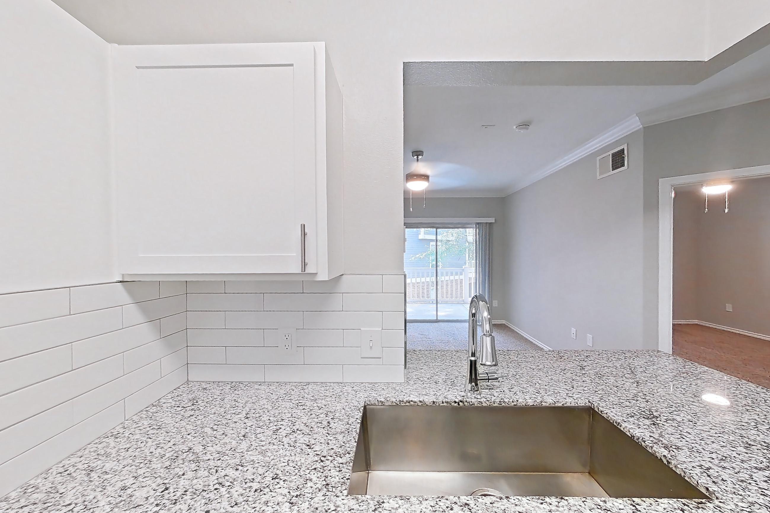 Kitchen in a 1A floor plan apartment, representative of Apartment 1237 at Reserve at Kingwood