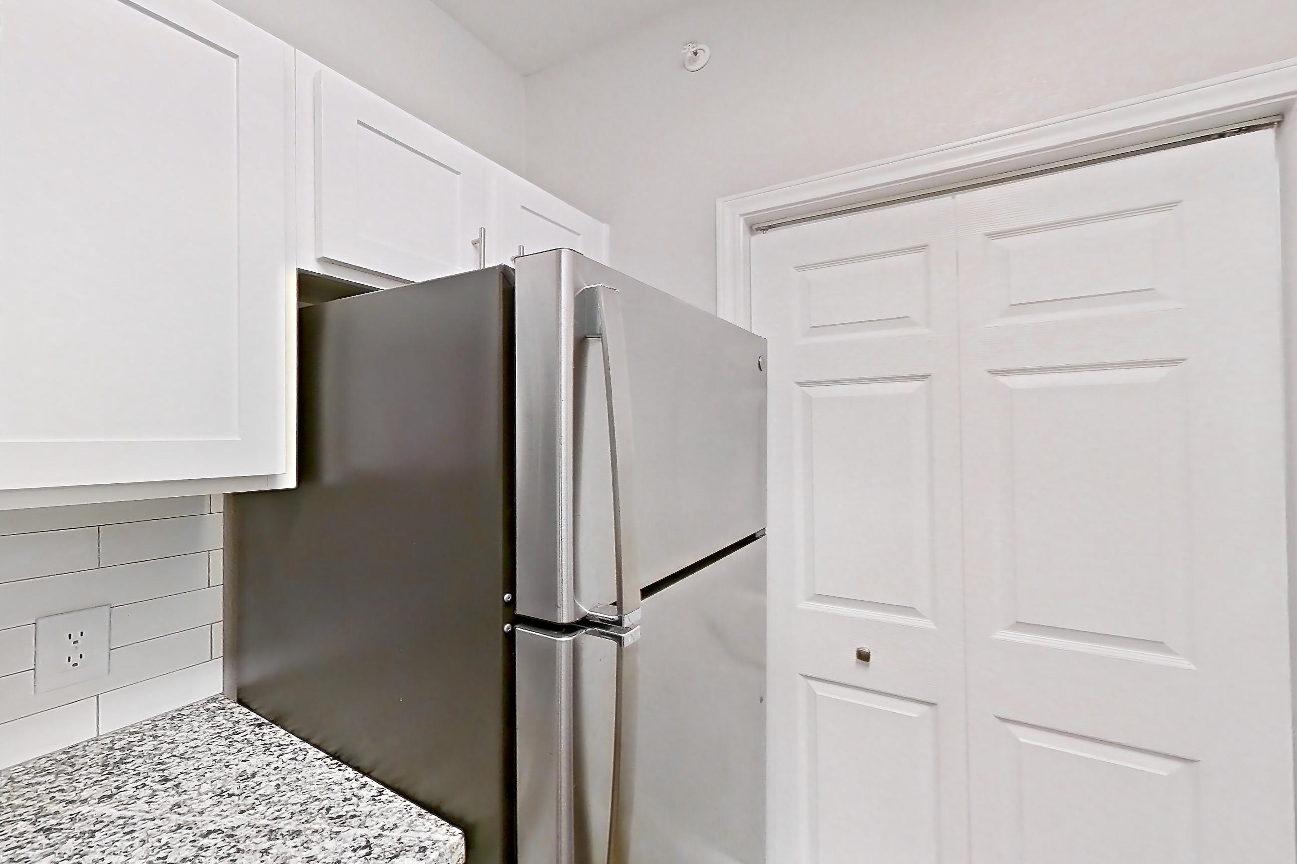 Kitchen in a 1A floor plan apartment, representative of Apartment 1237 at Reserve at Kingwood