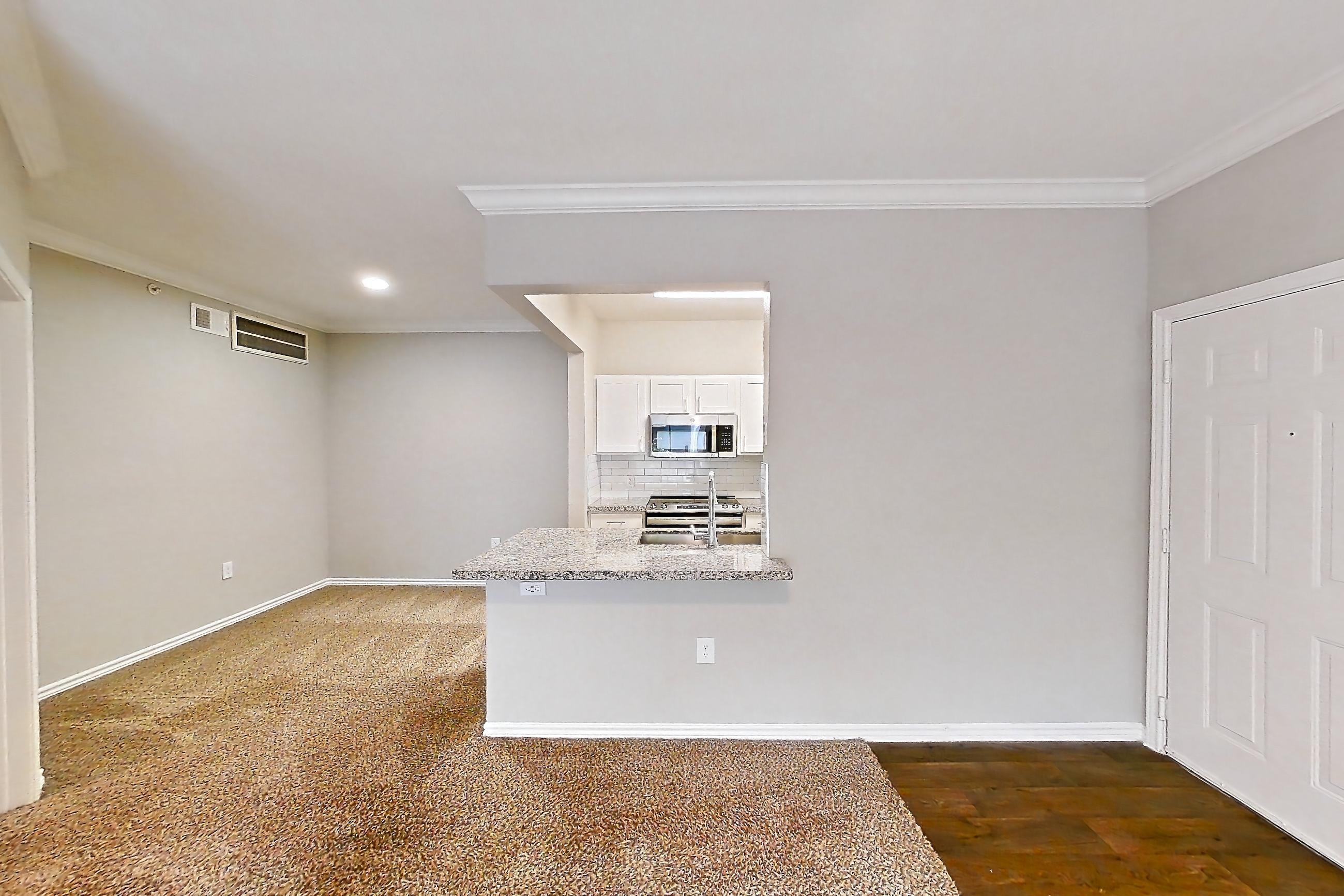 Living room in a 1A floor plan apartment, representative of Apartment 1237 at Reserve at Kingwood