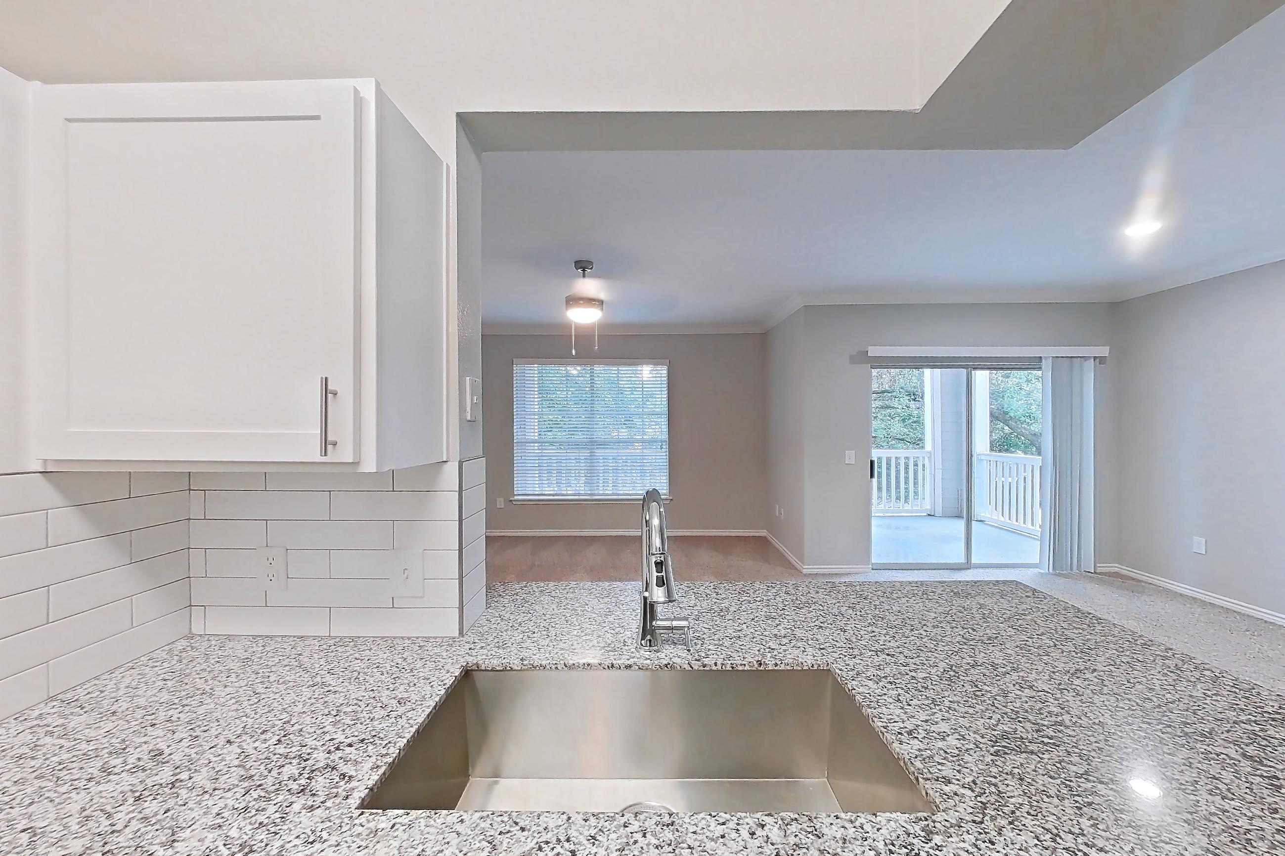 Kitchen in a 1B floor plan apartment, representative of Apartment 0823 at Reserve at Kingwood