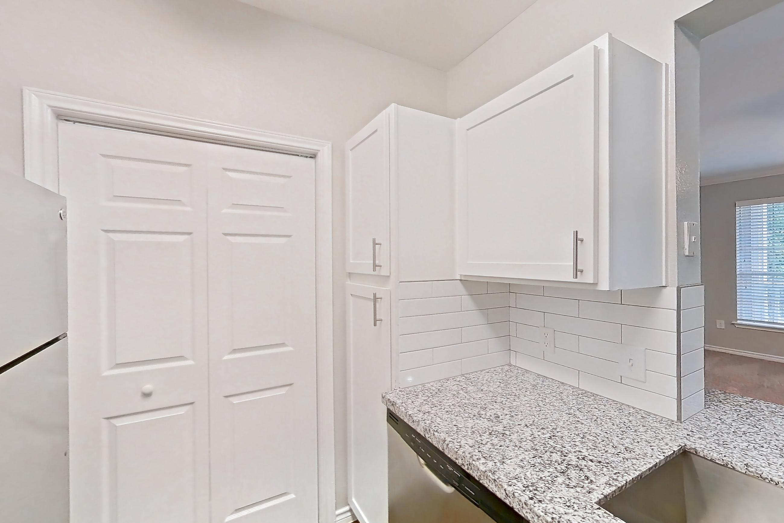 Kitchen in a 1B floor plan apartment, representative of Apartment 0823 at Reserve at Kingwood