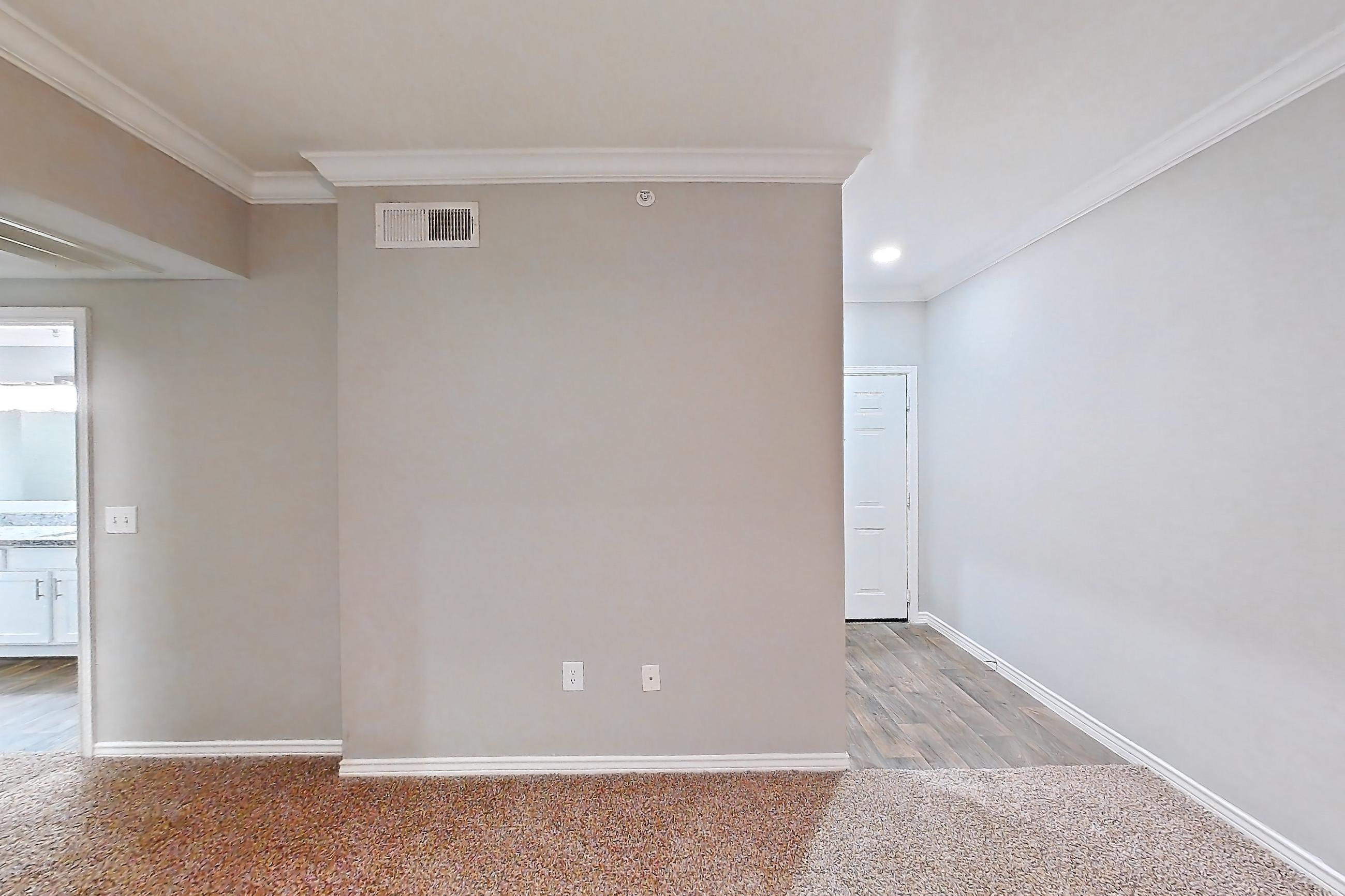 Living room with electric range, light carpet, light stone countertops, oven/range, and stainless steel appliances, Apartment 0920 at Reserve at Kingwood
