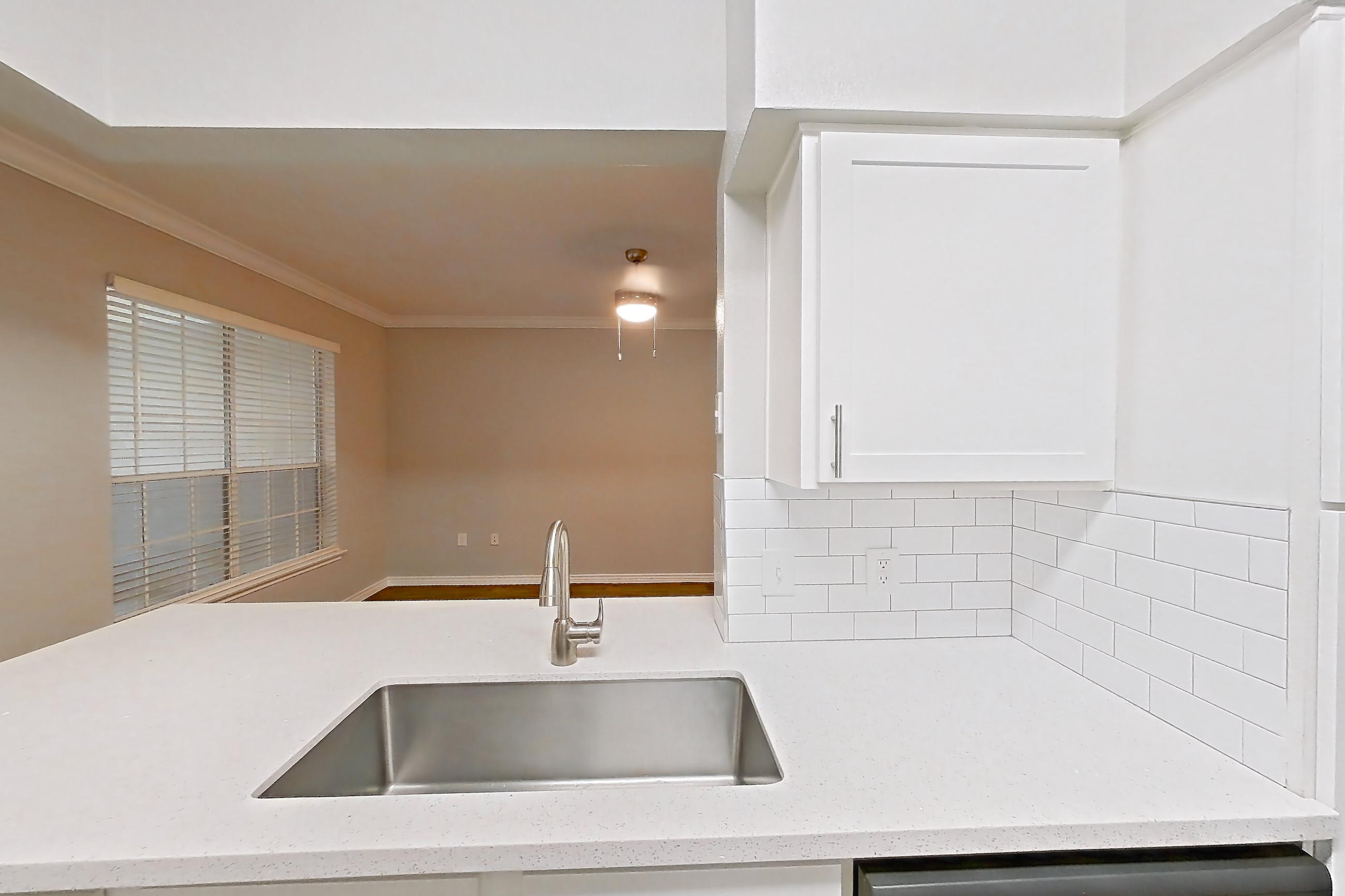 Kitchen in a 1C floor plan apartment, representative of Apartment 0410 at Reserve at Kingwood