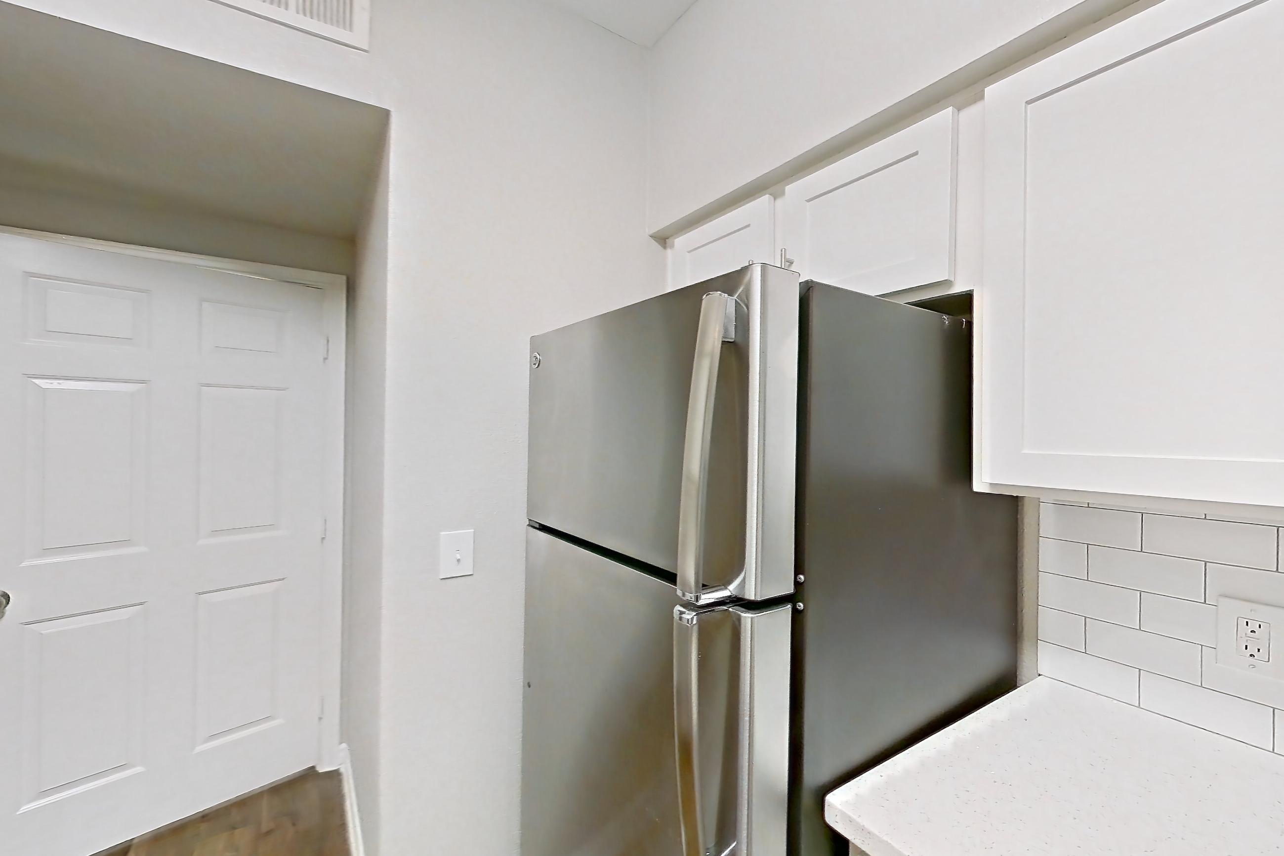 Kitchen in a 1C floor plan apartment, representative of Apartment 0410 at Reserve at Kingwood