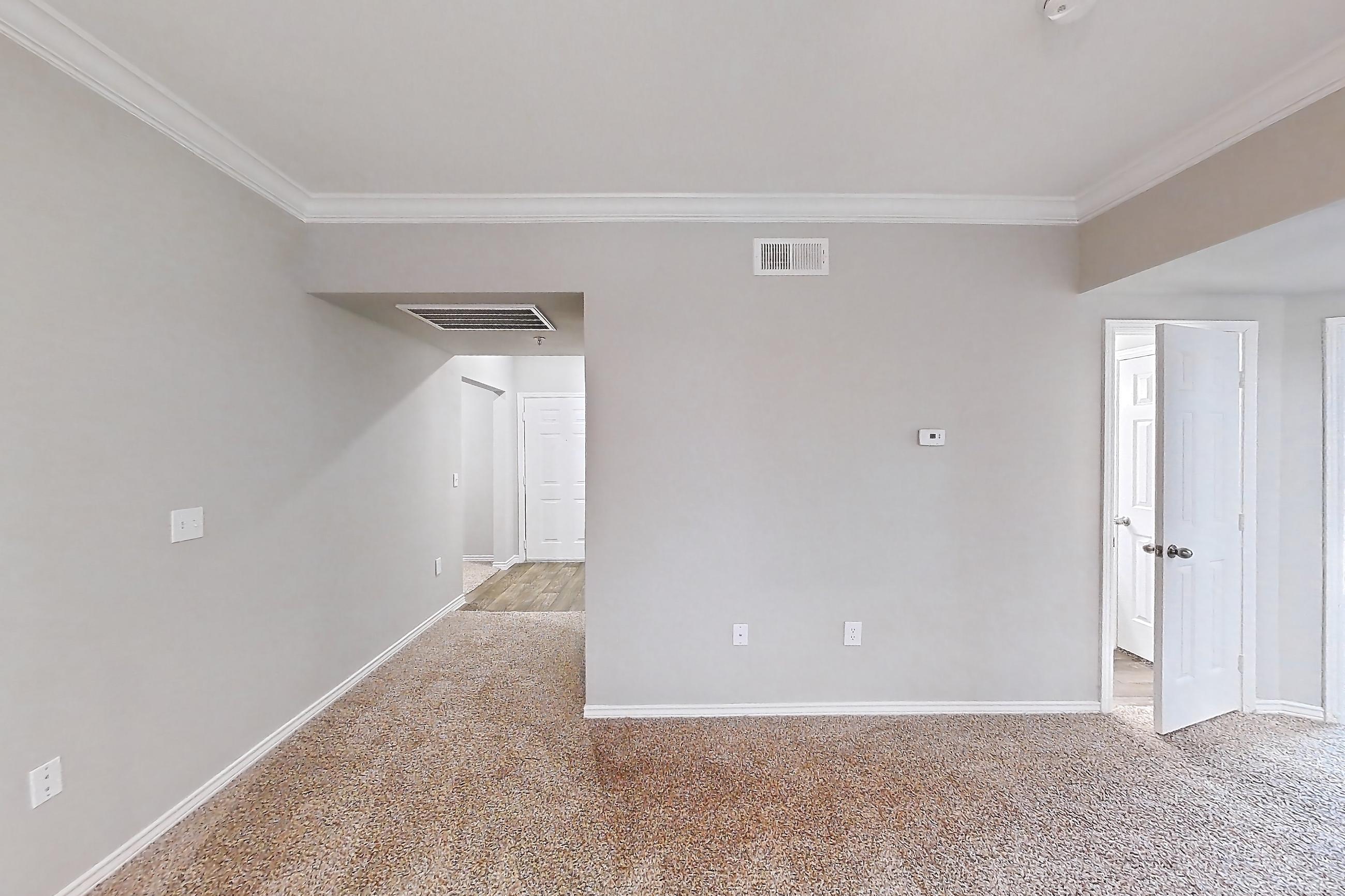 Living room with electric range and oven/range, Apartment 1031 at Reserve at Kingwood