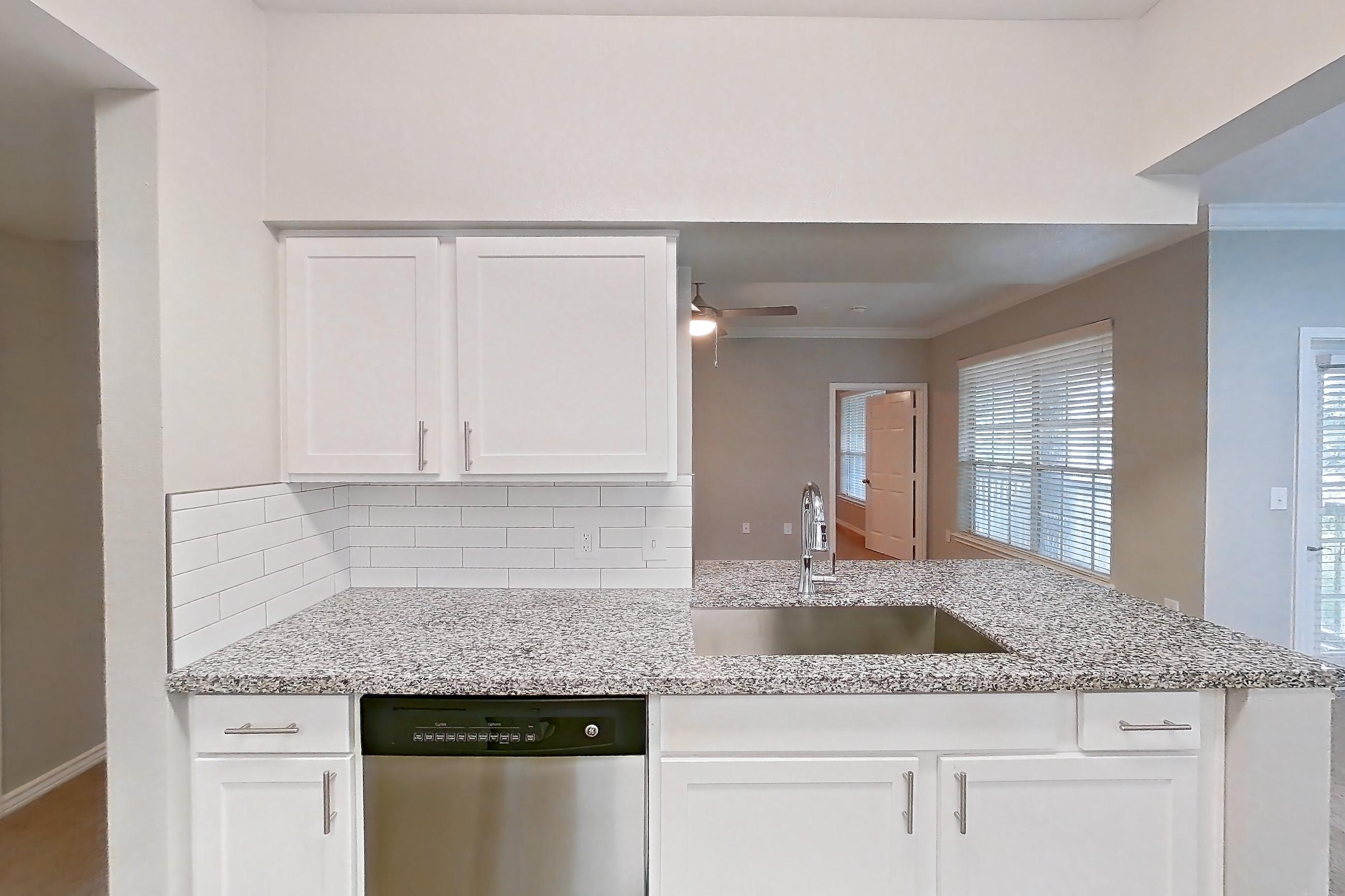 Kitchen in a 2B floor plan apartment, representative of Apartment 1038 at Reserve at Kingwood