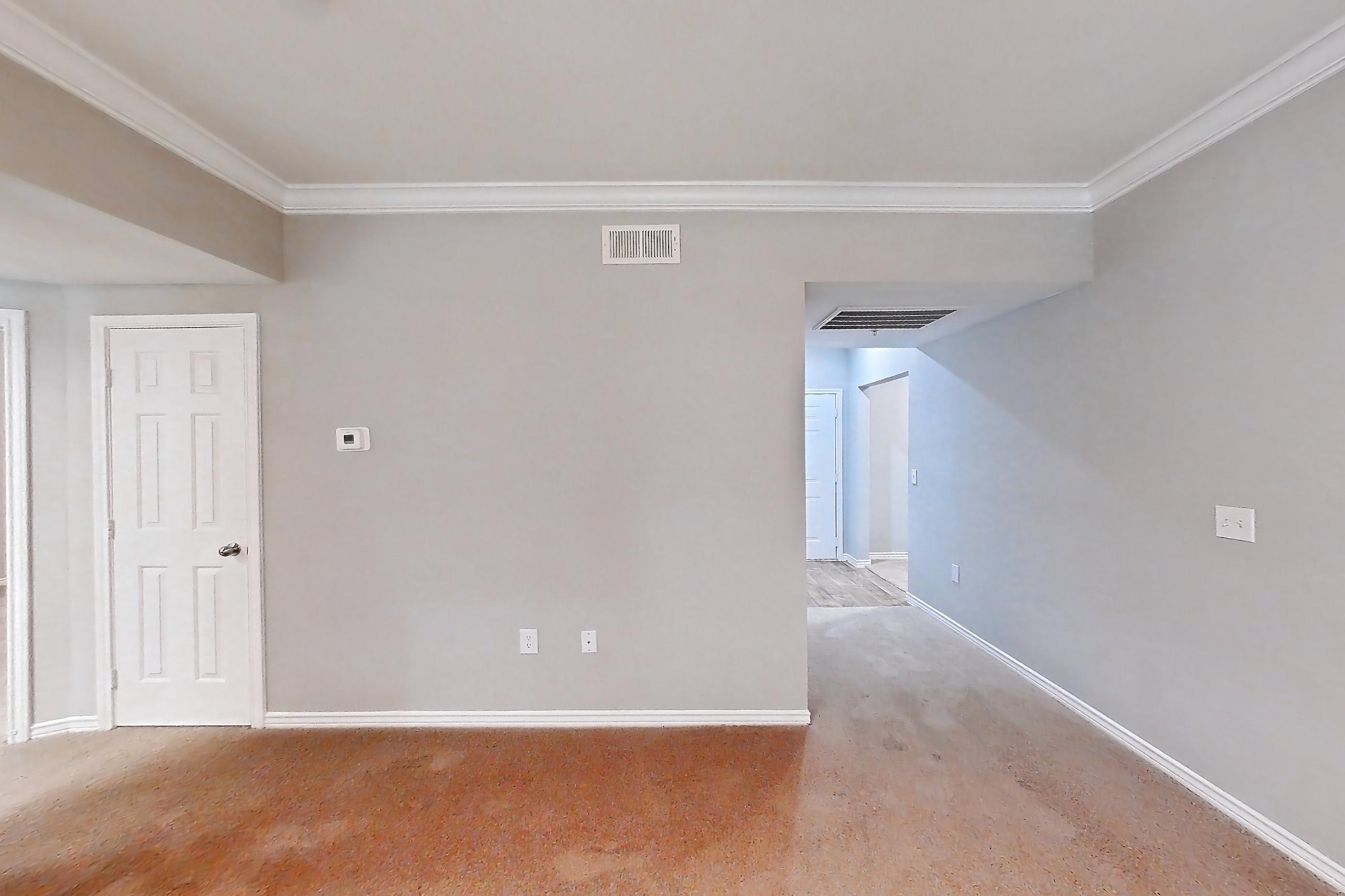 Living room in a 2B floor plan apartment, representative of Apartment 1038 at Reserve at Kingwood