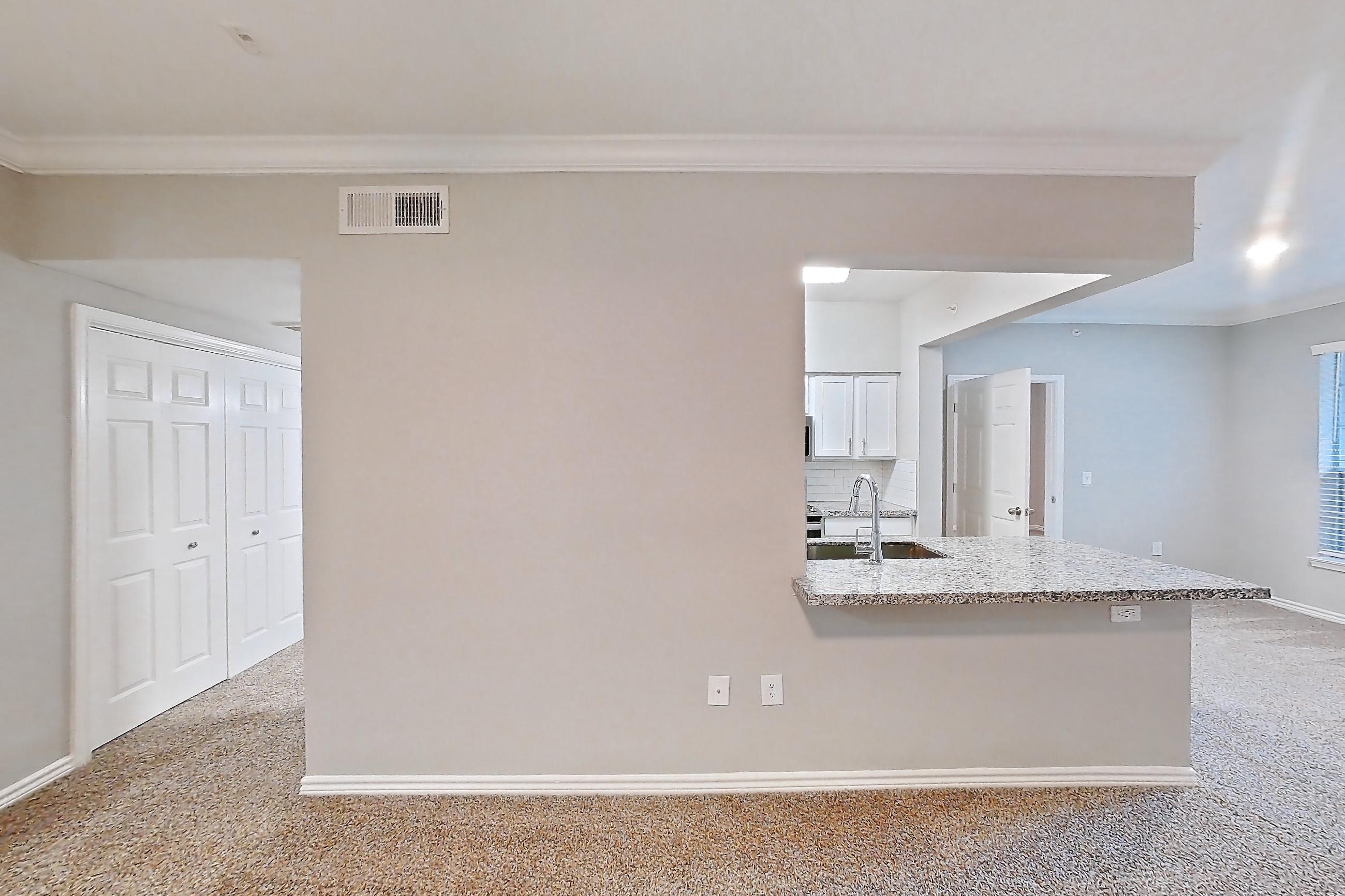 Living room with light carpet, Apartment 1122 at Reserve at Kingwood