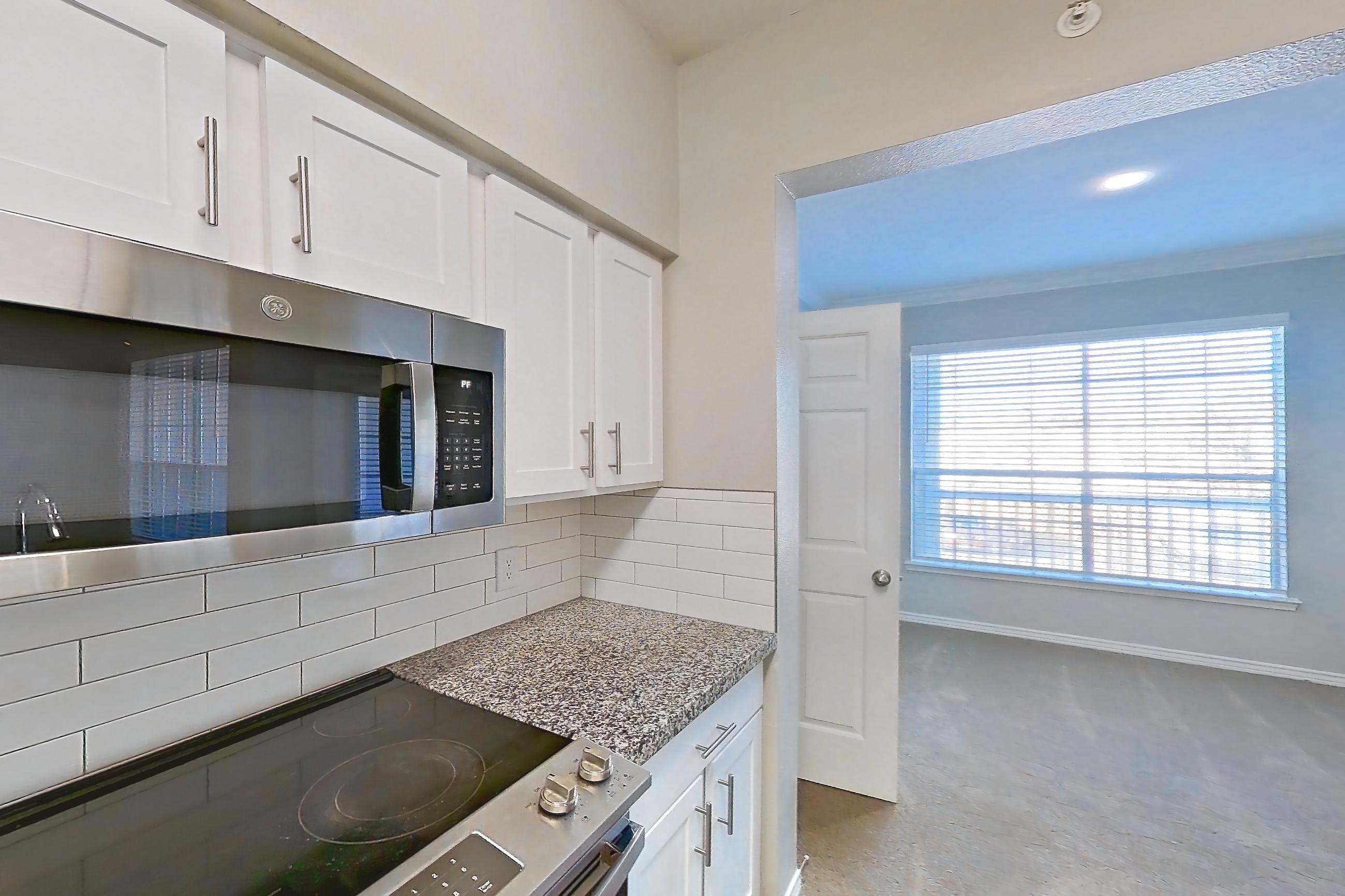 Kitchen in a 2D floor plan apartment, representative of Apartment 0927 at Reserve at Kingwood
