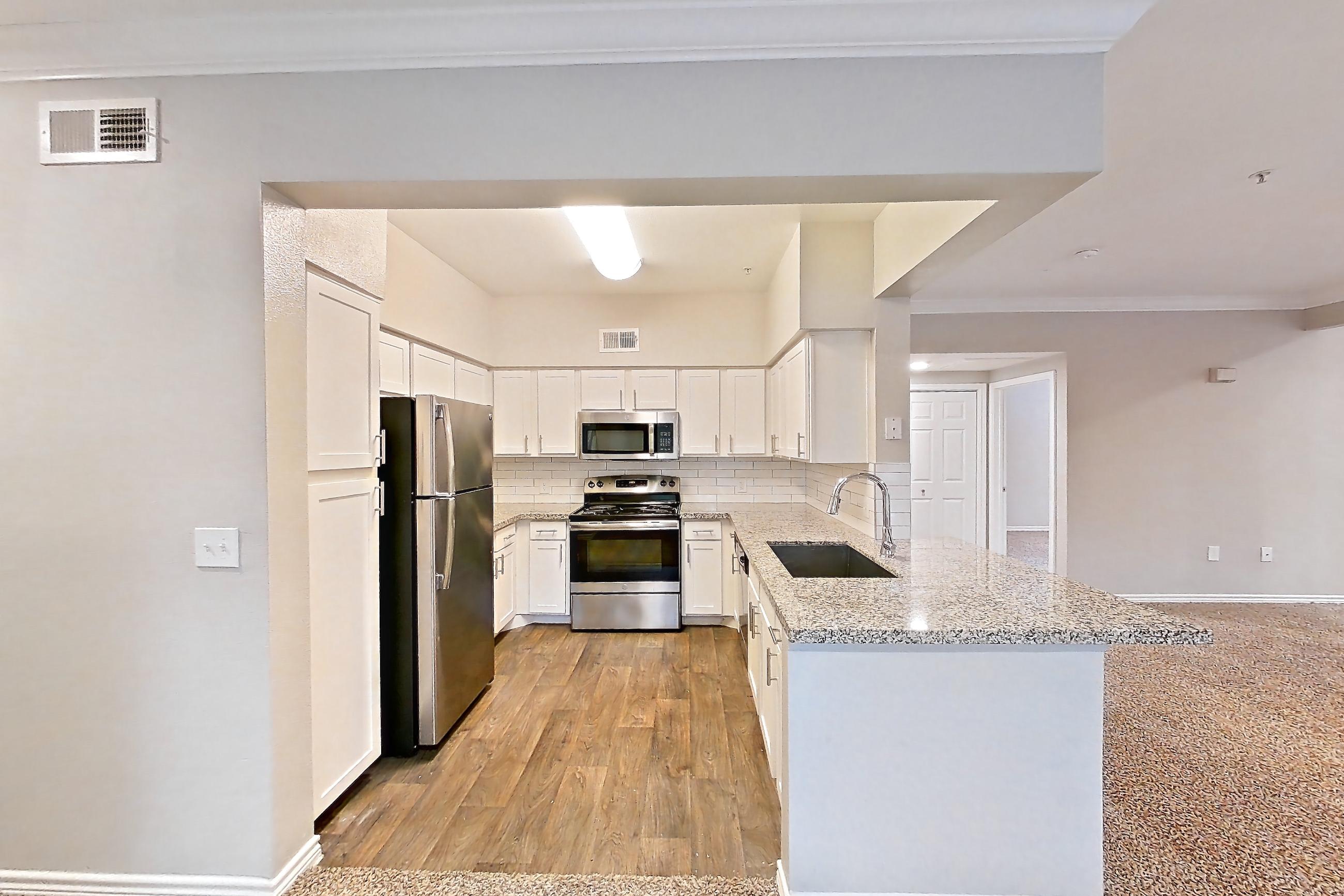 Dining room in a 2E floor plan apartment, representative of Apartment 0725 at Reserve at Kingwood