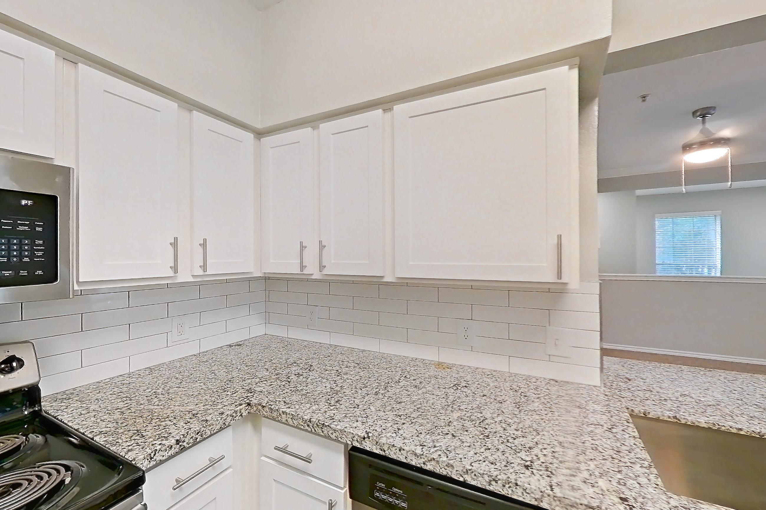 Kitchen in a 2E floor plan apartment, representative of Apartment 0725 at Reserve at Kingwood