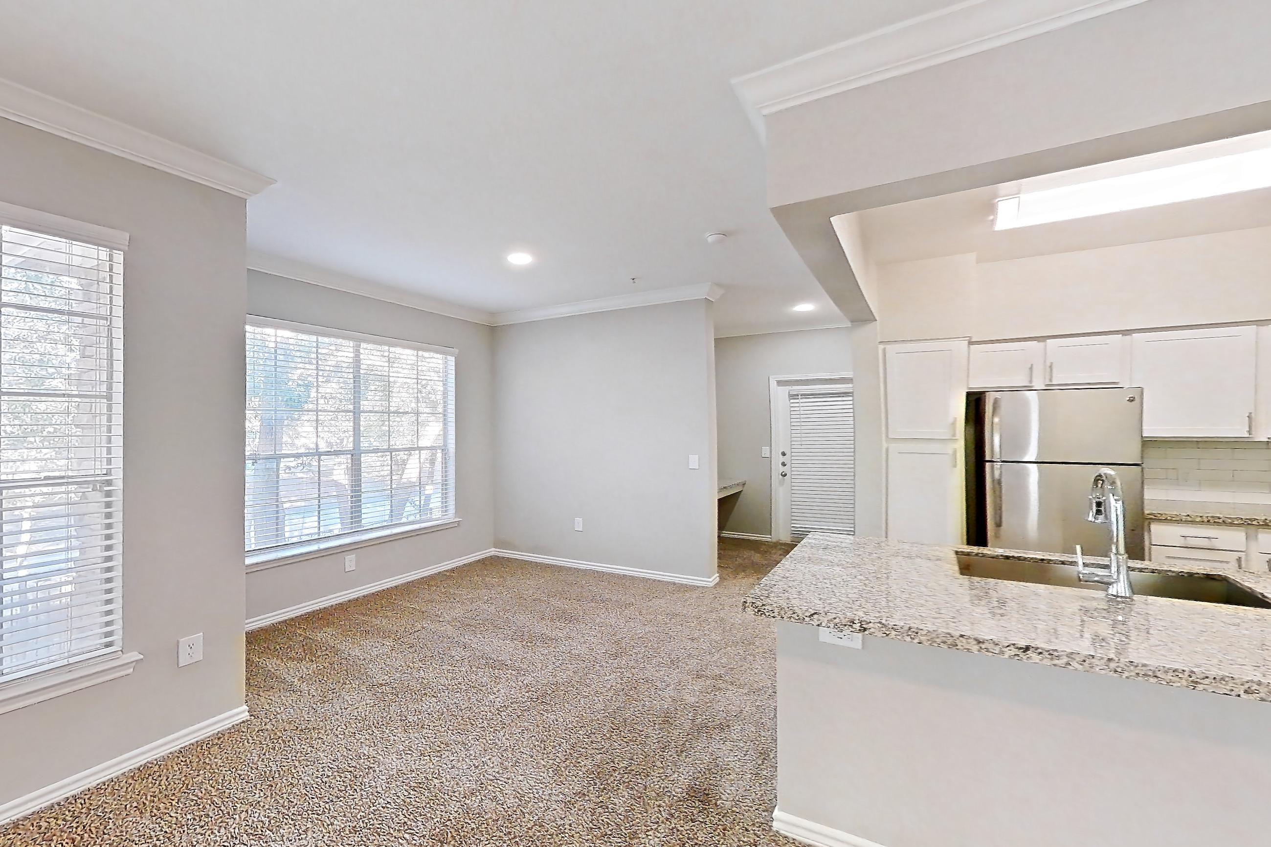 Living room in a 2E floor plan apartment, representative of Apartment 0725 at Reserve at Kingwood