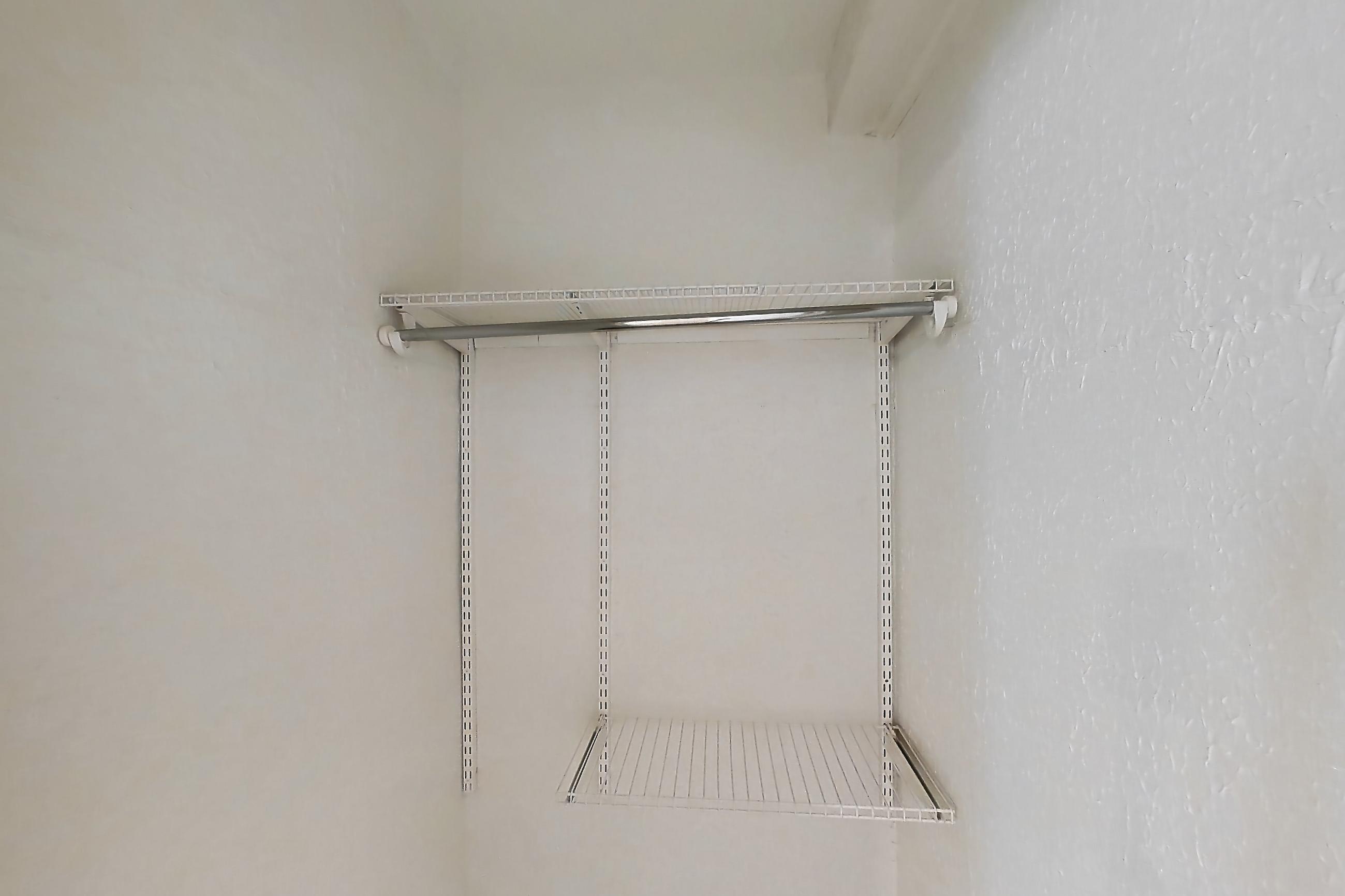 LIVING ROOM CLOSET (representative of this floor plan)