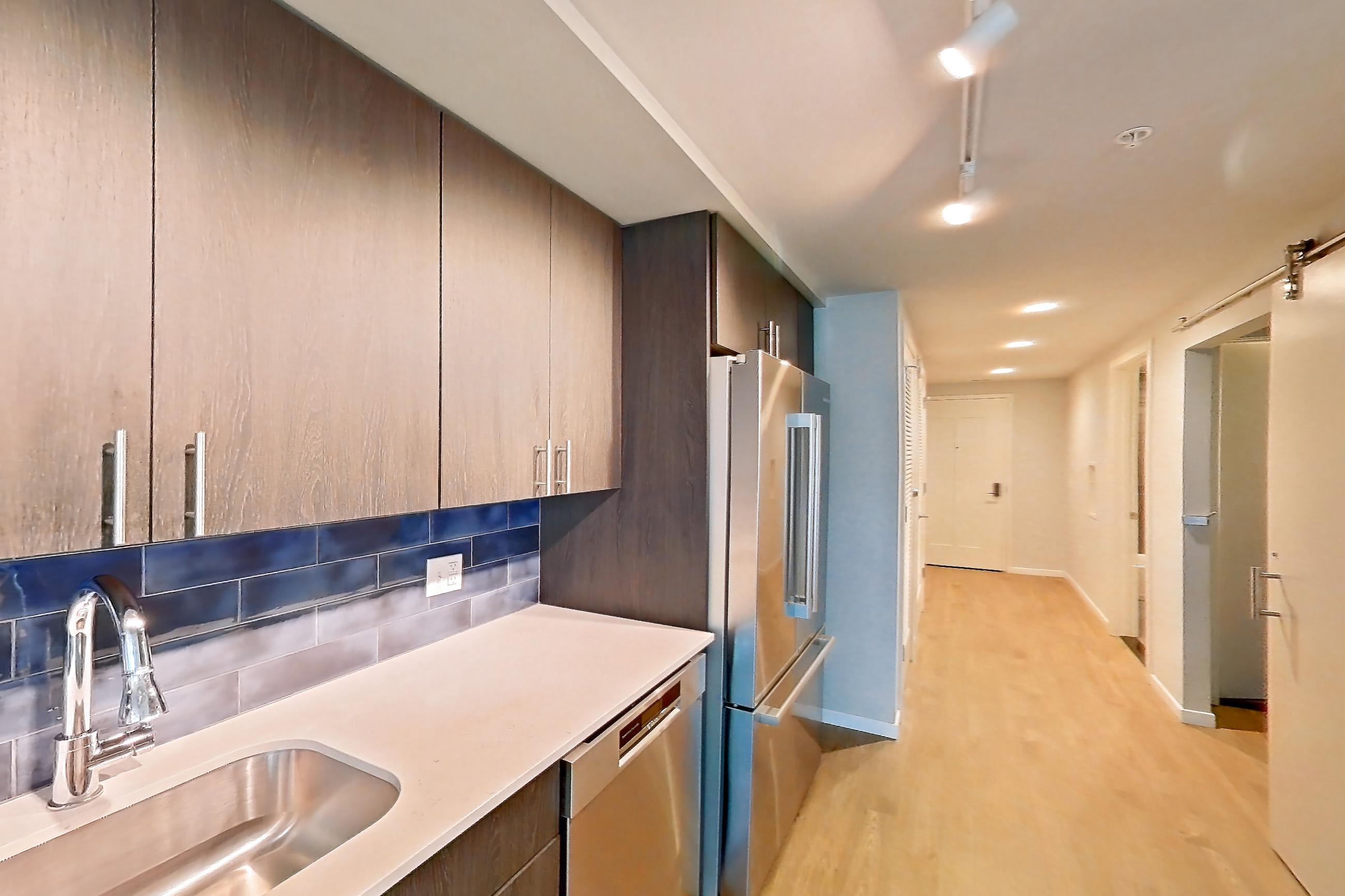 Kitchen in Apartment 1-0803 at Cortland Rosslyn, A20 - East floor plan