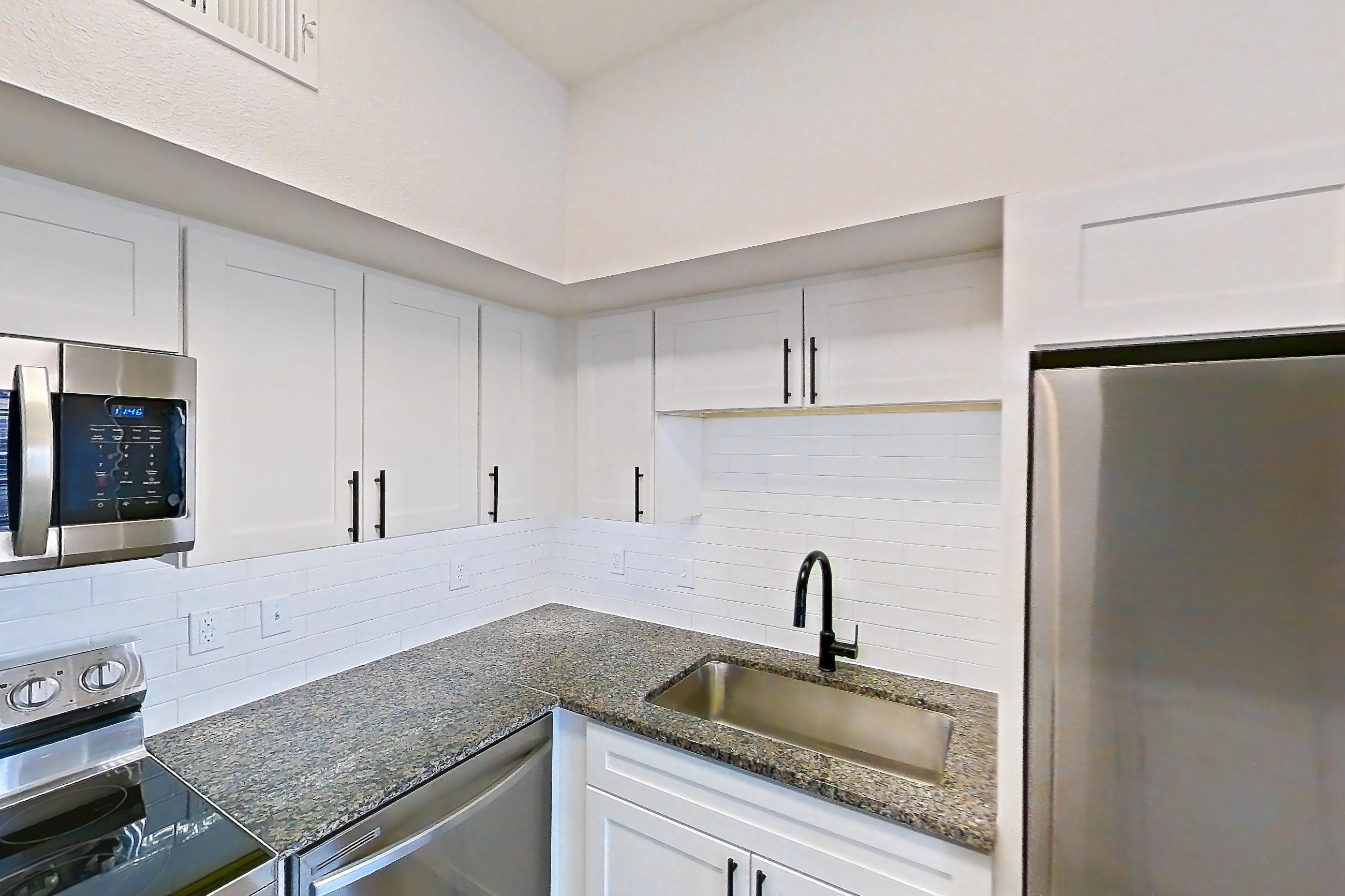 Kitchen in Apartment 12-302 at Cortland Westminster, A3R - Breckenridge floor plan