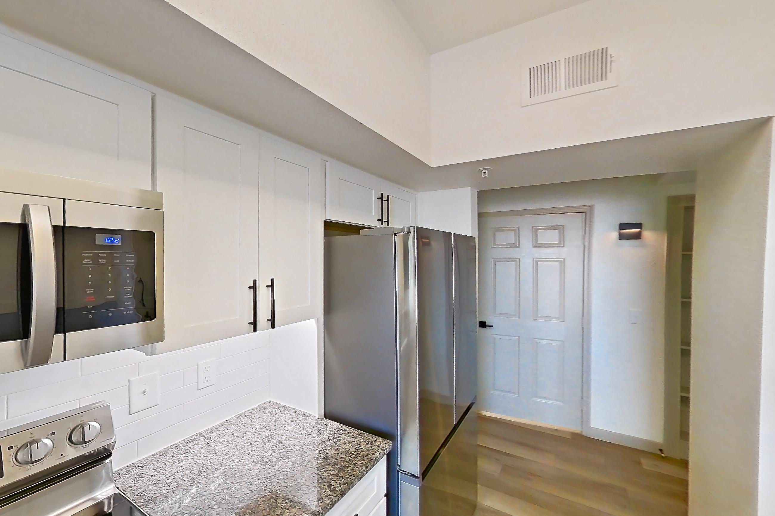 Kitchen in Apartment 16-207 at Cortland Westminster, B1R - Conifer floor plan