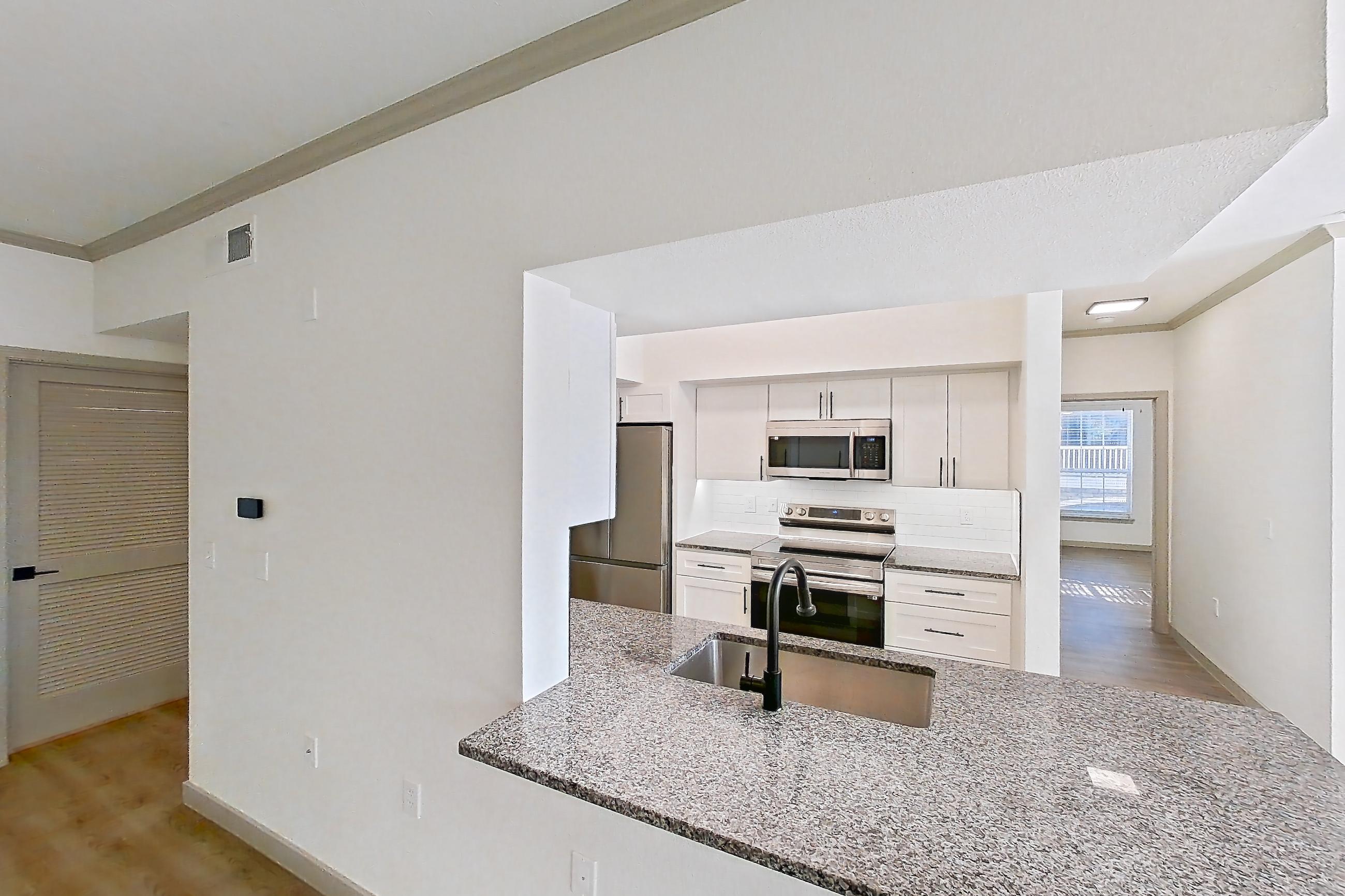 Living space in Apartment 15-205 at Cortland Westminster, B3R - Evergreen floor plan