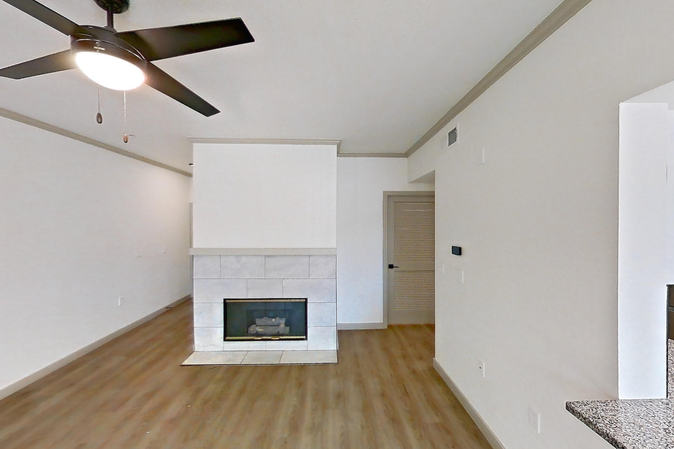 Living space in Apartment 15-205 at Cortland Westminster, B3R - Evergreen floor plan