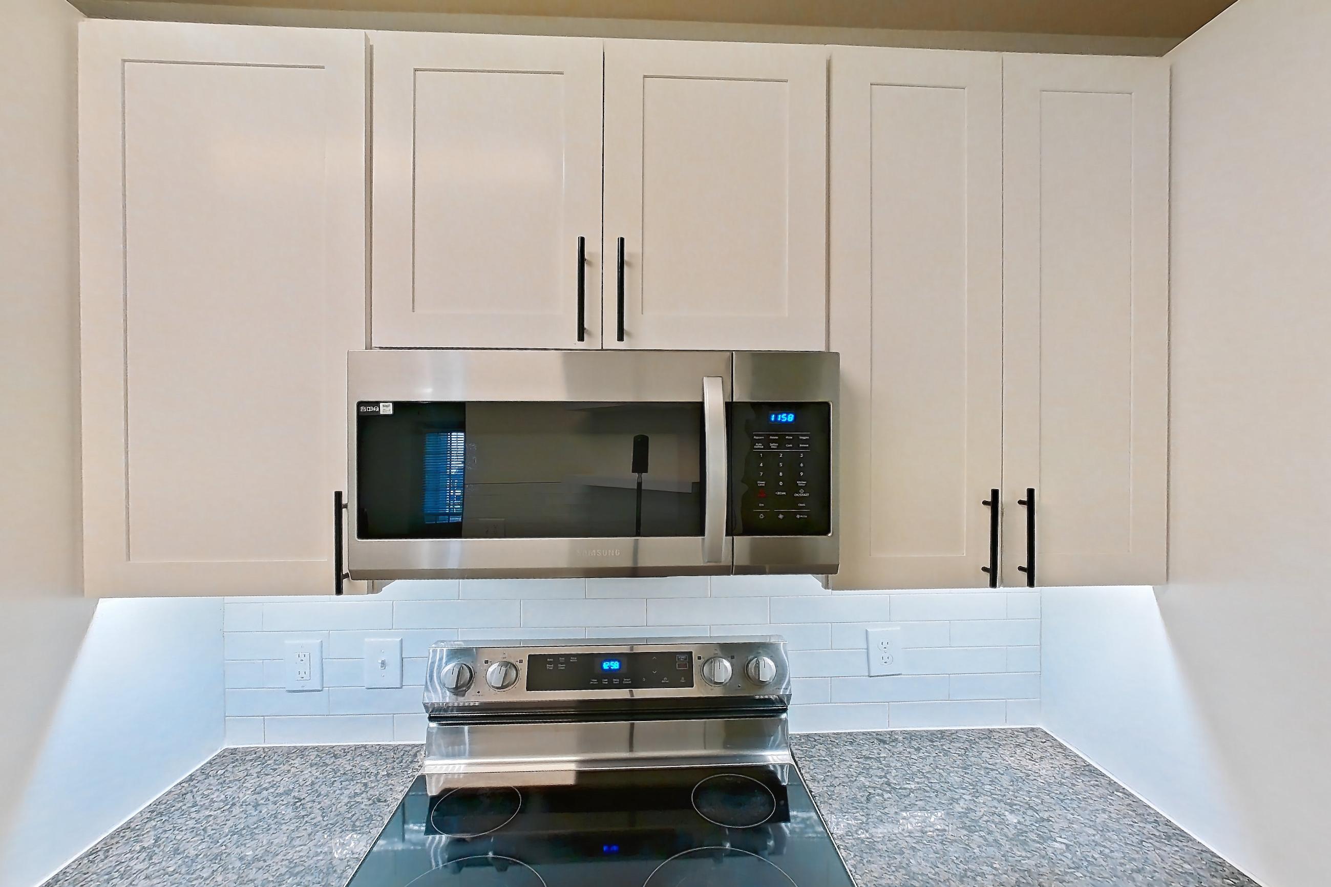 Kitchen in Apartment 14-103 at Cortland Westminster, B4R - Frisco floor plan