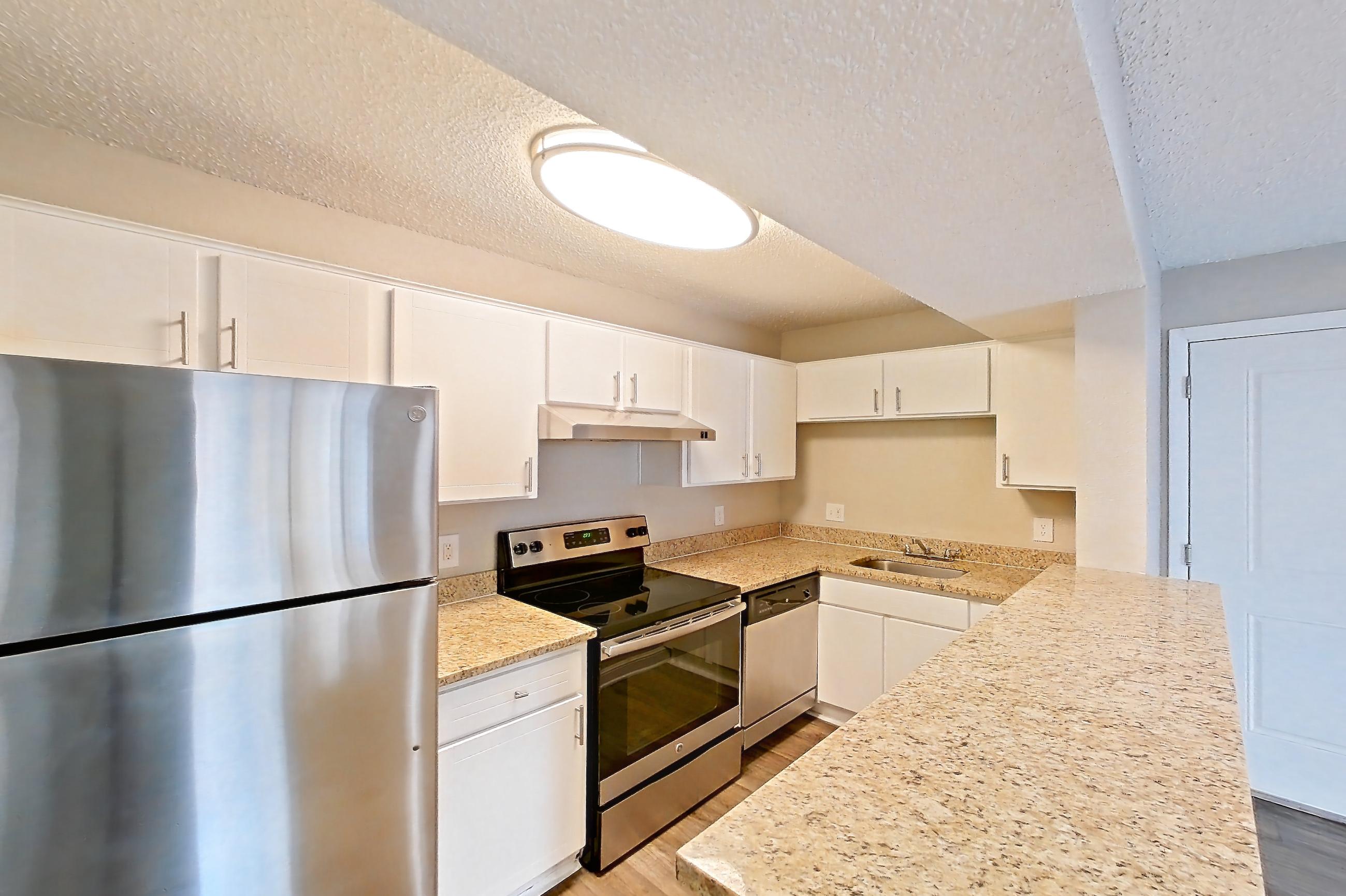 Kitchen entryway in Apartment 1205 at Cortland at the Hammocks, A1 - Boxwood - E floor plan