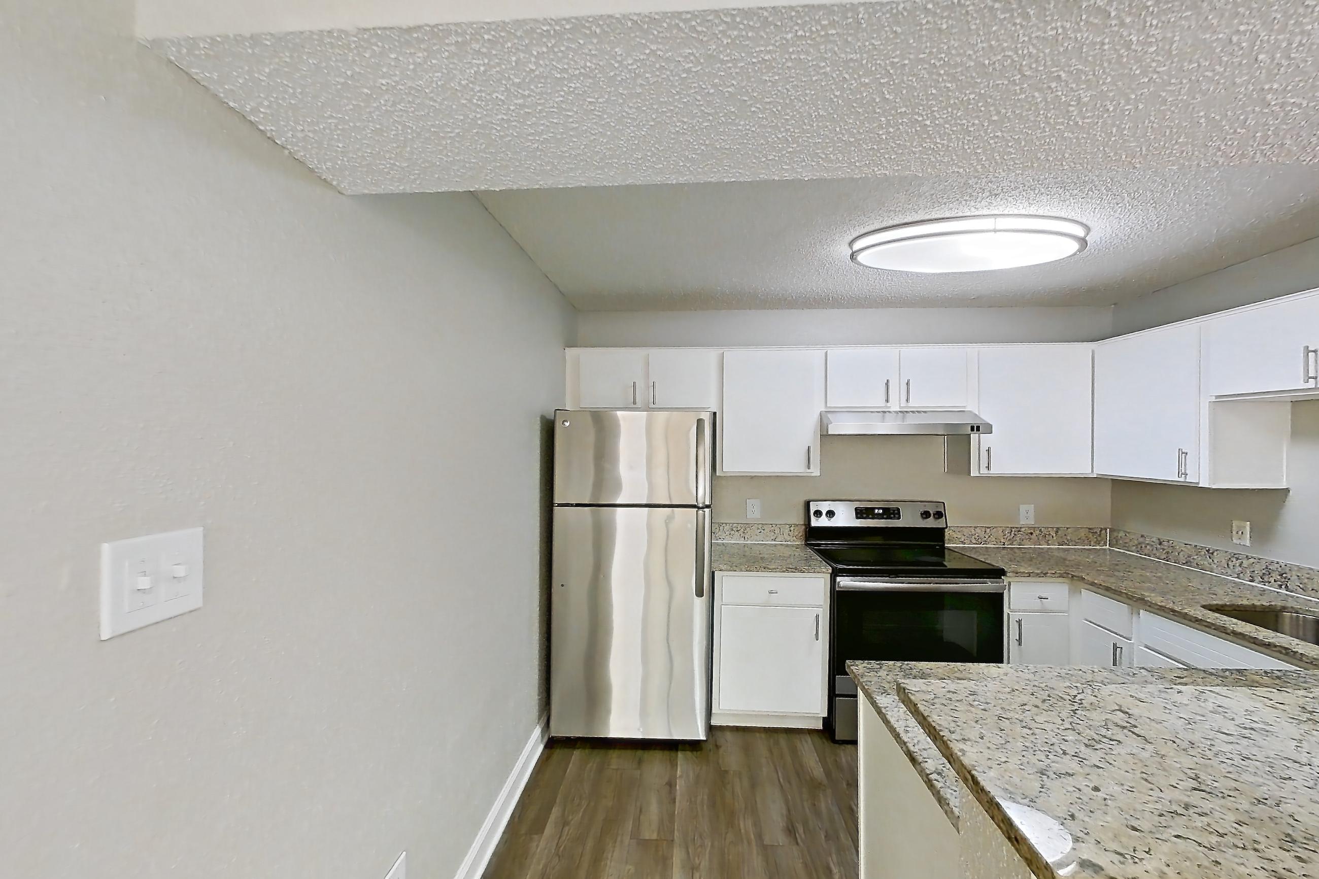 Kitchen entryway in Apartment 2416 at Cortland at the Hammocks, A3 - Cypress - E floor plan