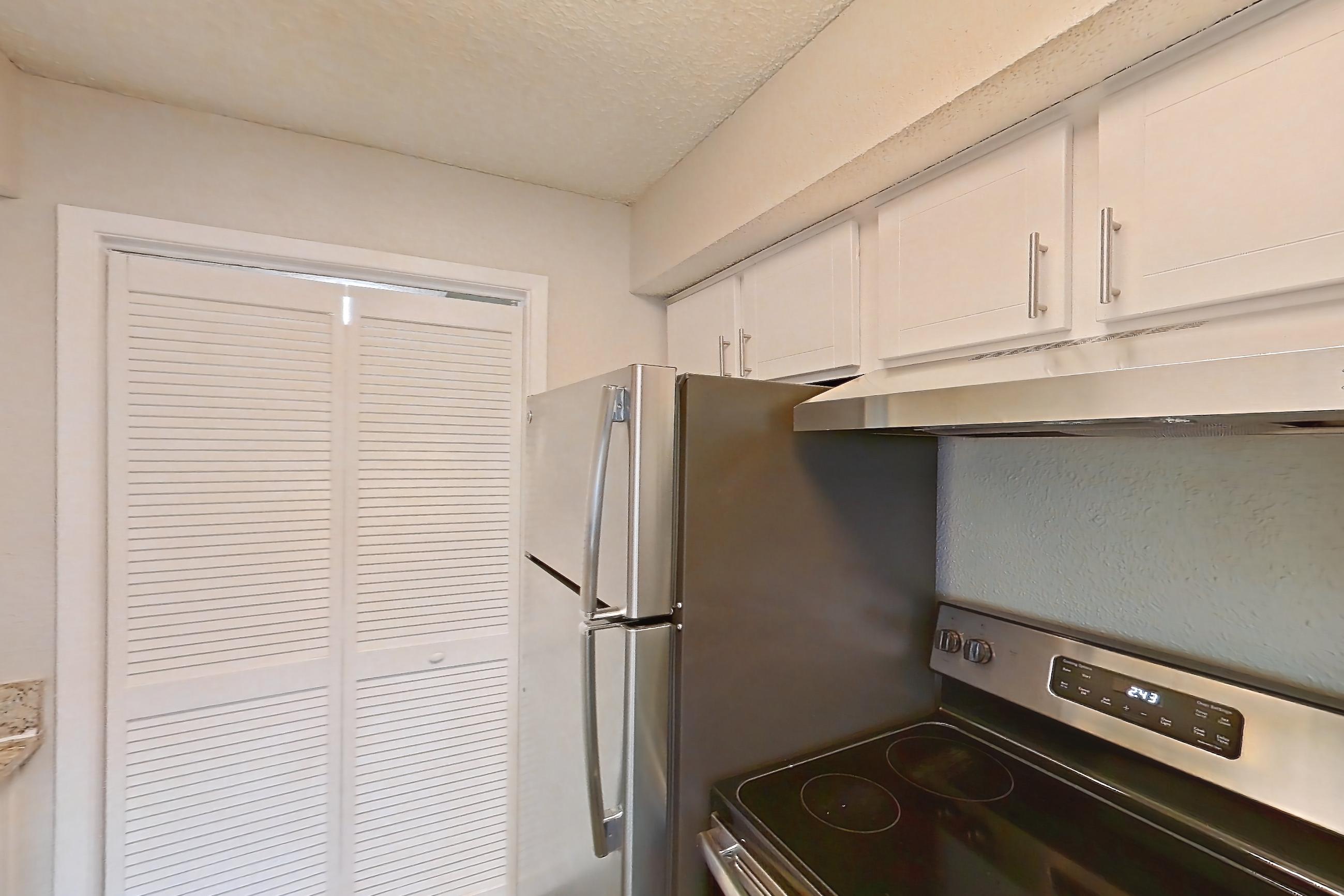 Kitchen in Apartment 1707 at Cortland at the Hammocks, B1 - Mahogany - E floor plan