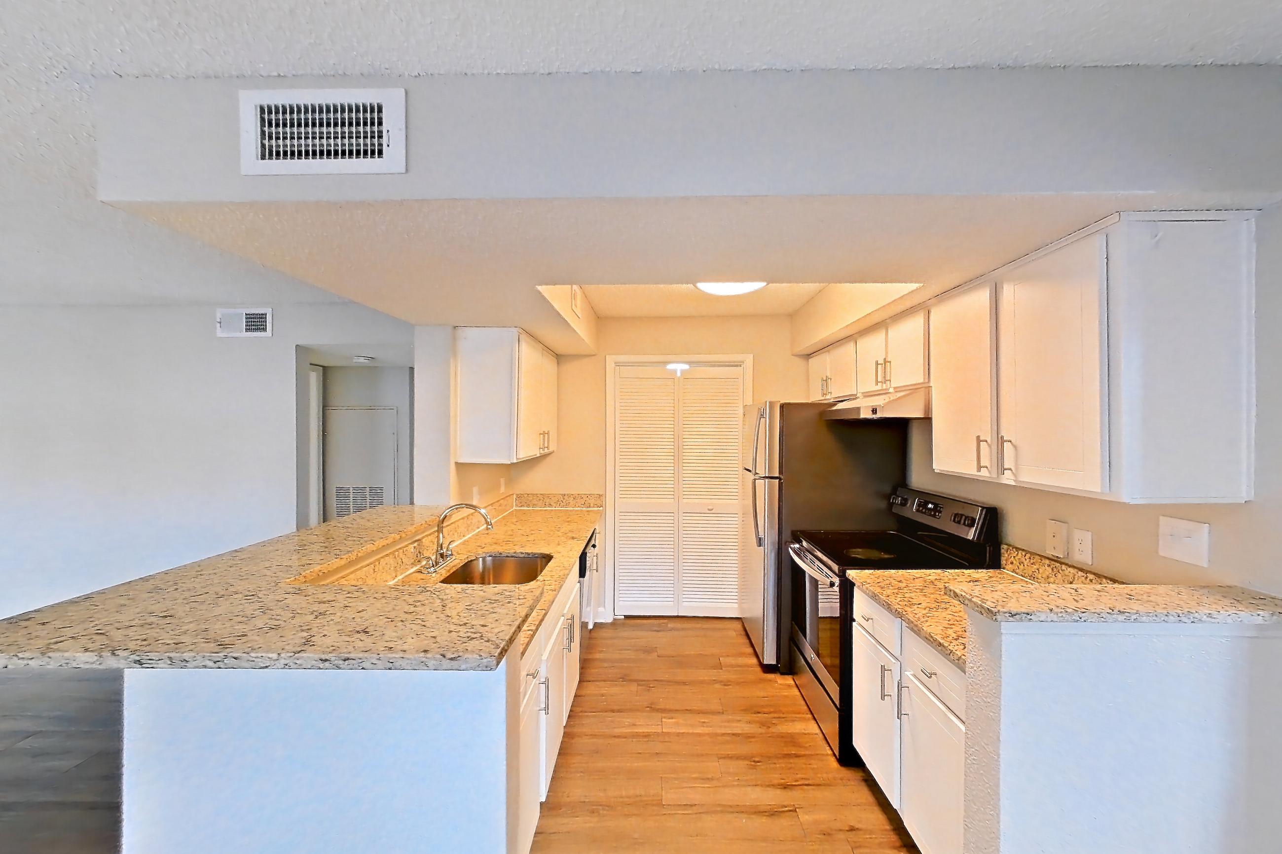 Living space in Apartment 1707 at Cortland at the Hammocks, B1 - Mahogany - E floor plan