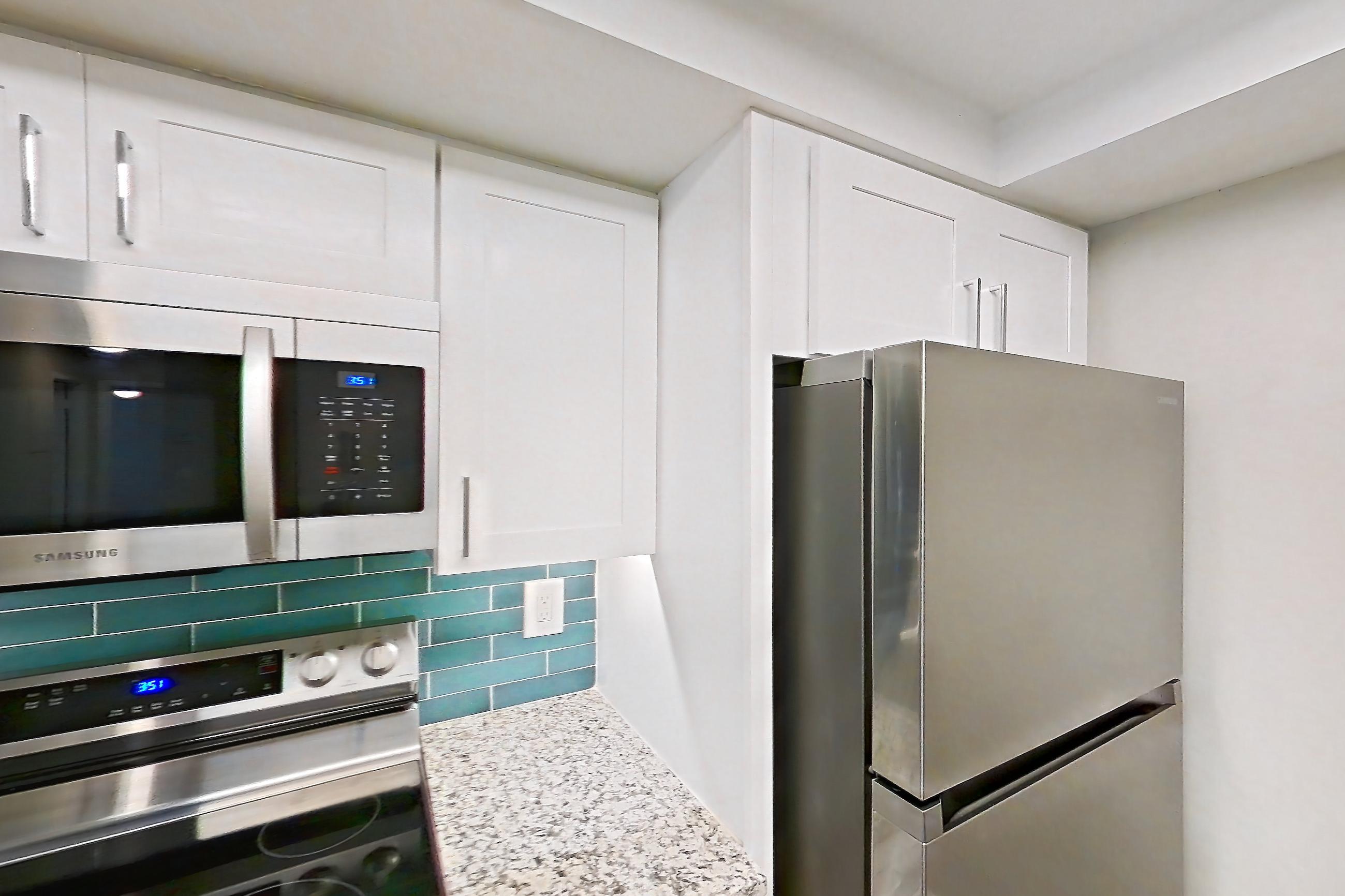 Kitchen in Apartment 02-037 at Cortland at the Hammocks, B3R - Silver Palm - W floor plan