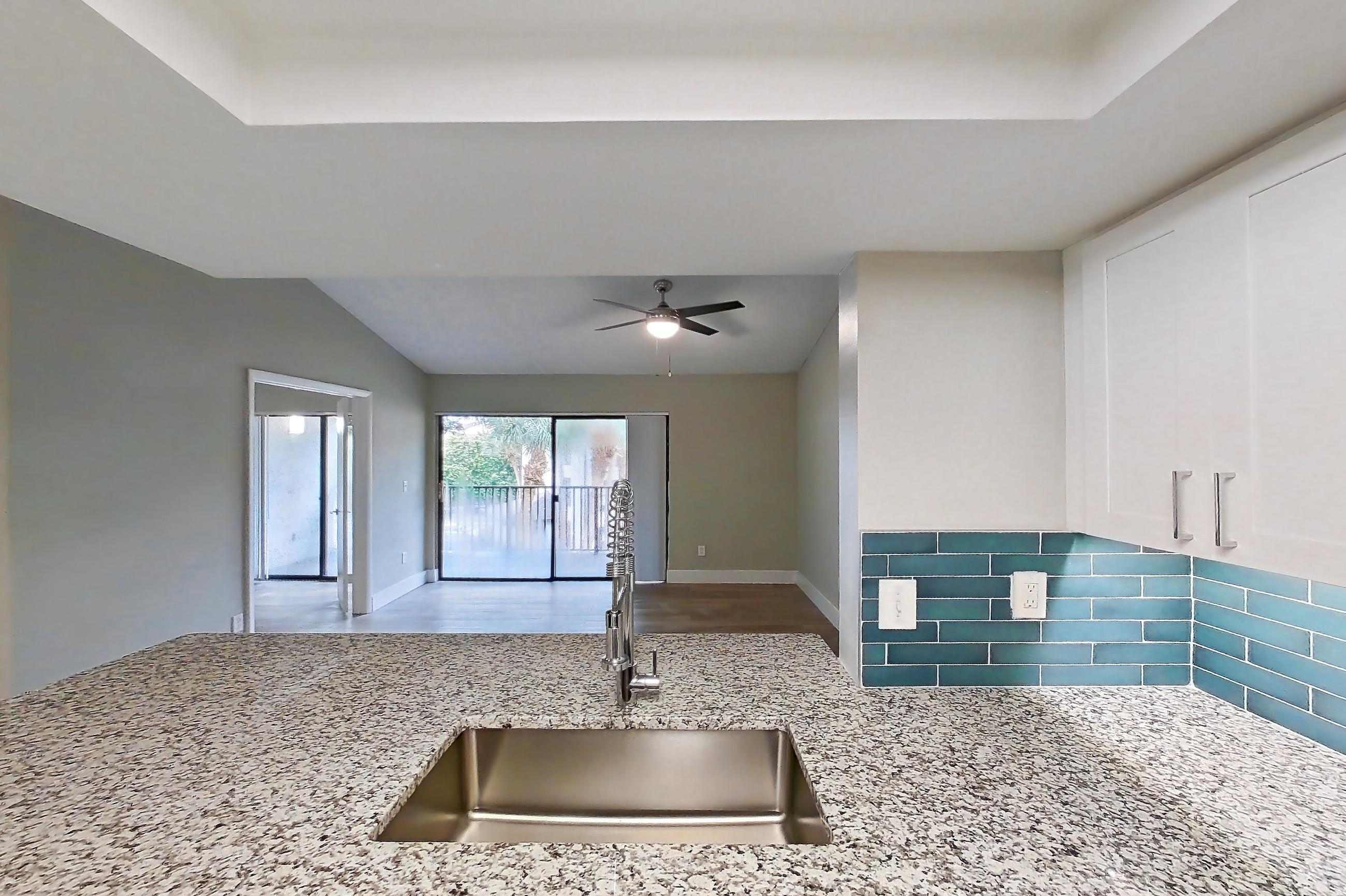 Kitchen in Apartment 02-037 at Cortland at the Hammocks, B3R - Silver Palm - W floor plan