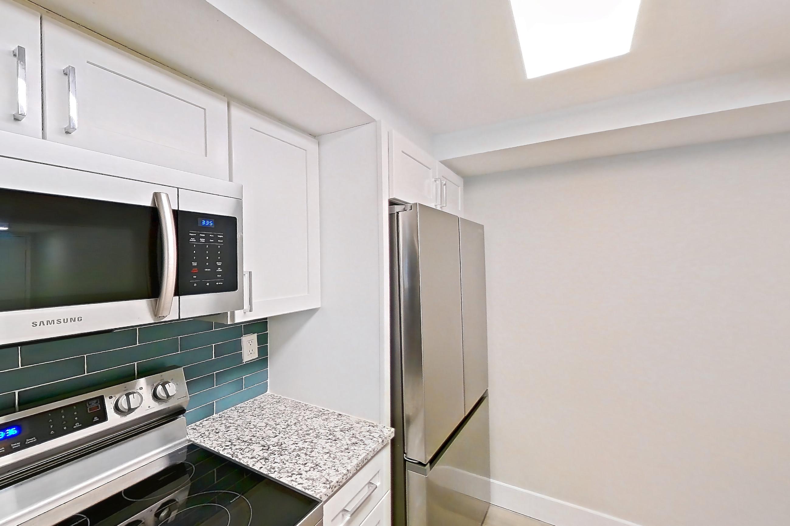 Kitchen in Apartment 10-032 at Cortland at the Hammocks, C1R - Sycamore - W floor plan