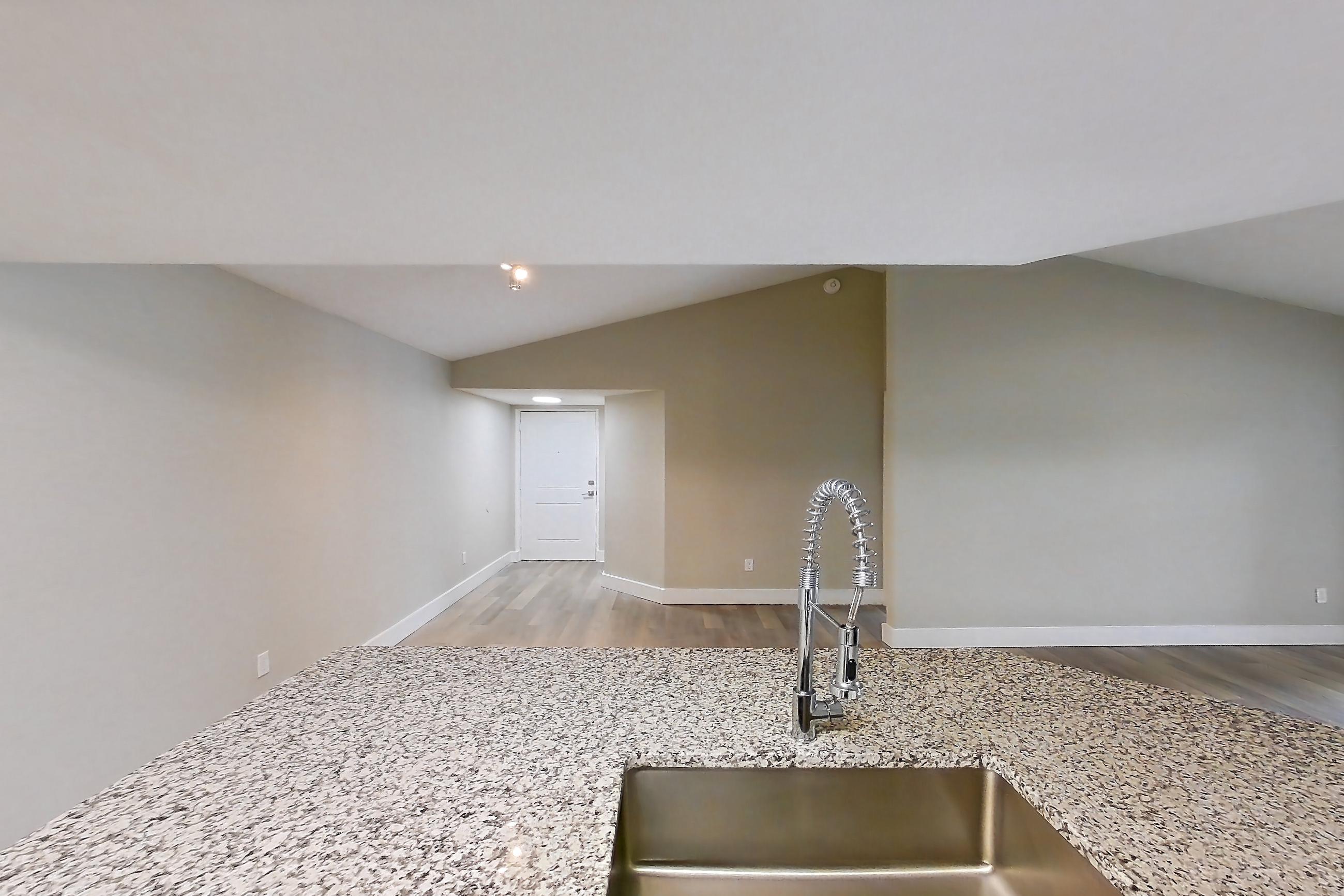Kitchen in Apartment 10-032 at Cortland at the Hammocks, C1R - Sycamore - W floor plan